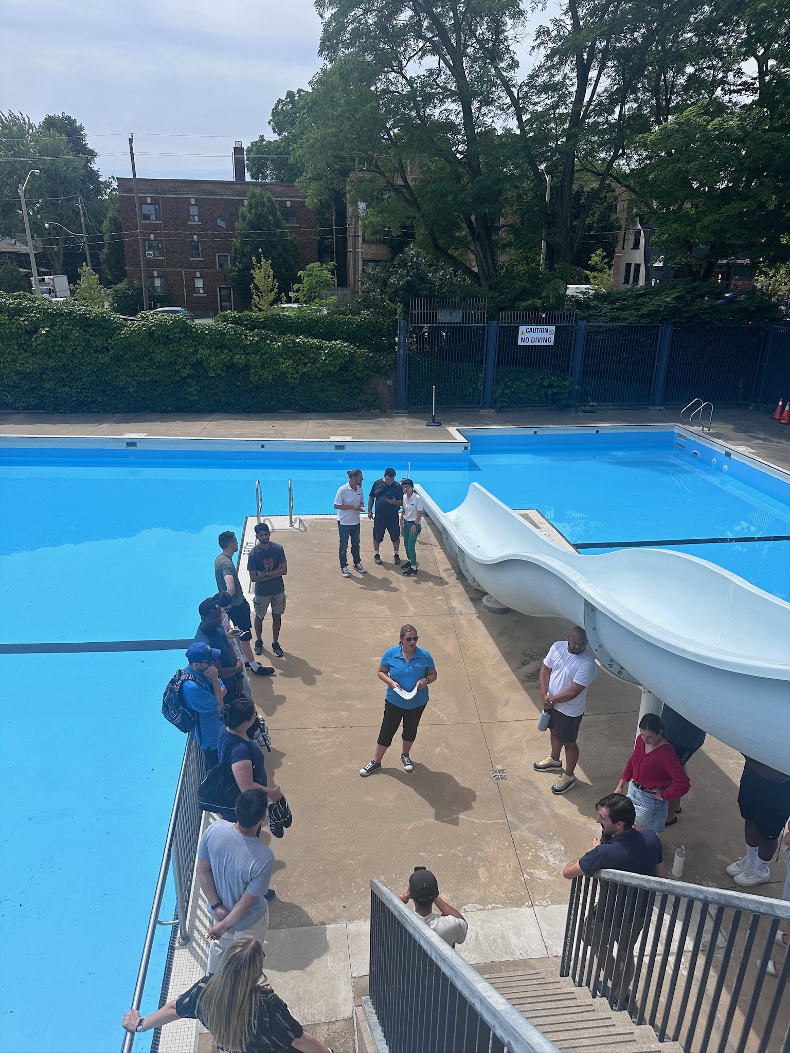 Pool Service Professional providing on site training to a group of ...