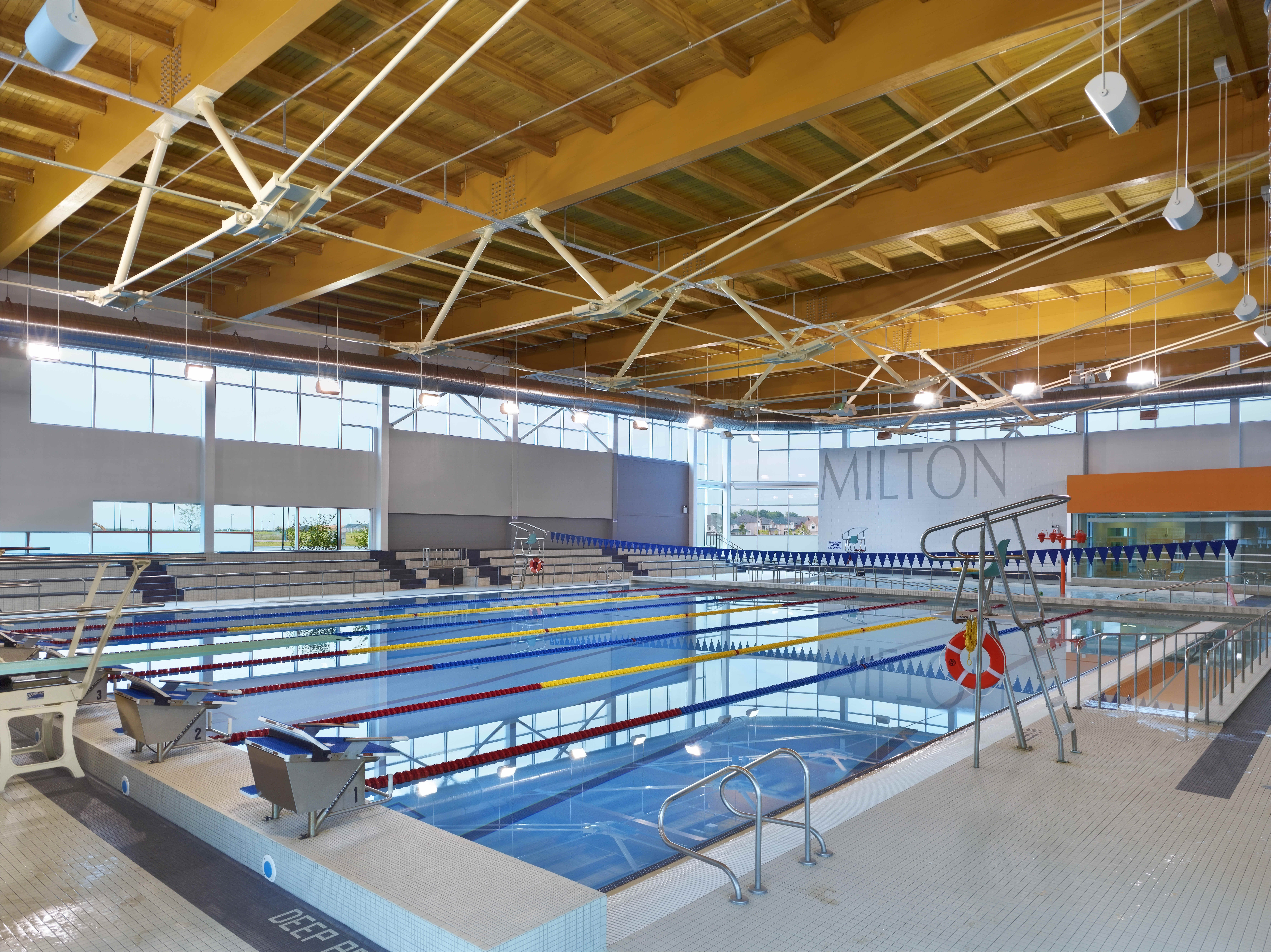 an-indoor-swimming-facility-with-lap-lanes-diving-boards-and-large
