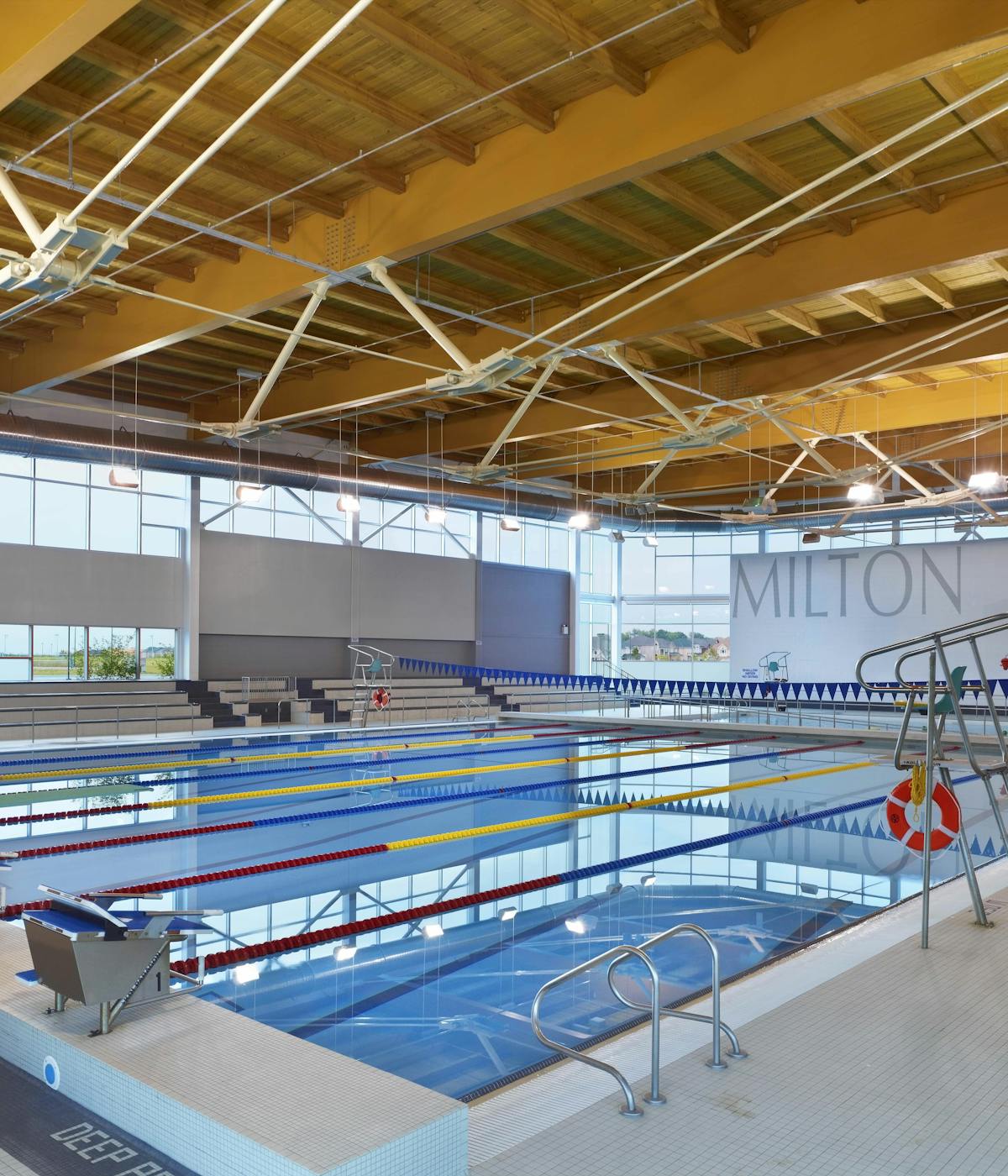 An Indoor Swimming Facility With Lap Lanes Diving Boards And Large an-indoor-swimming-facility-with-lap-lanes-diving-boards-and-large