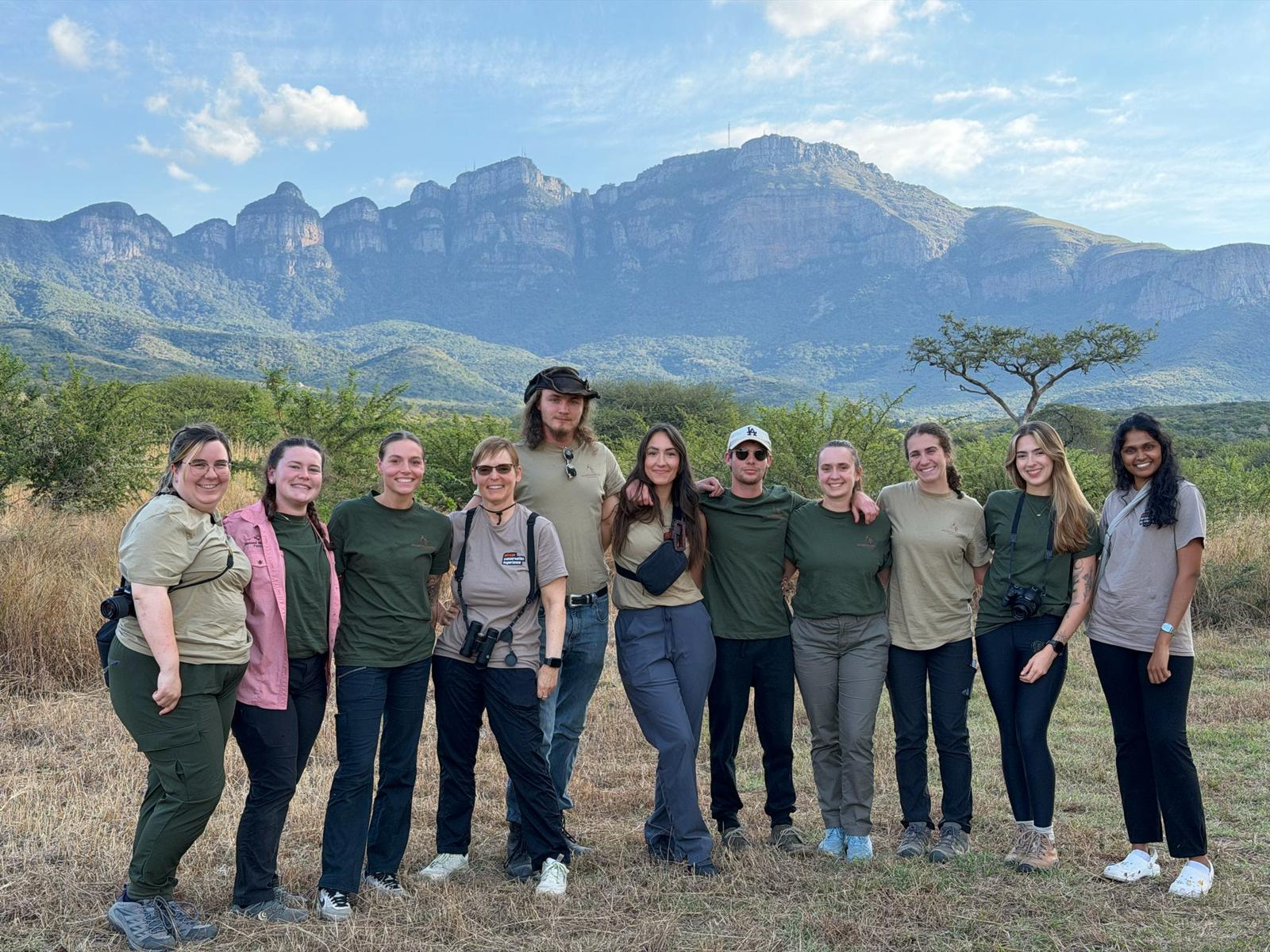 Group posing at the project
