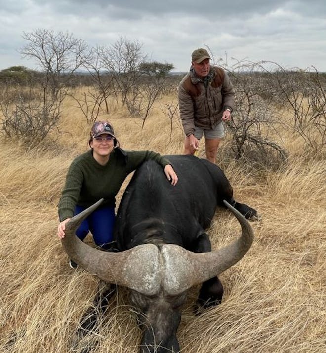 Michelle Roegiers: posing with a sedated buffalo