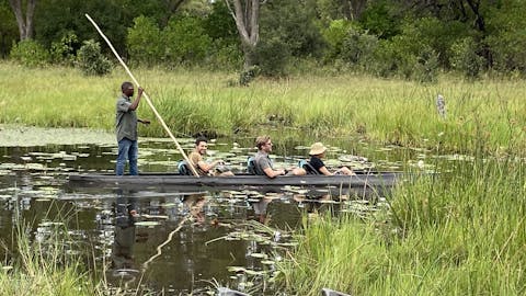 Josie and Adam: A group in a canoe in the Okavango