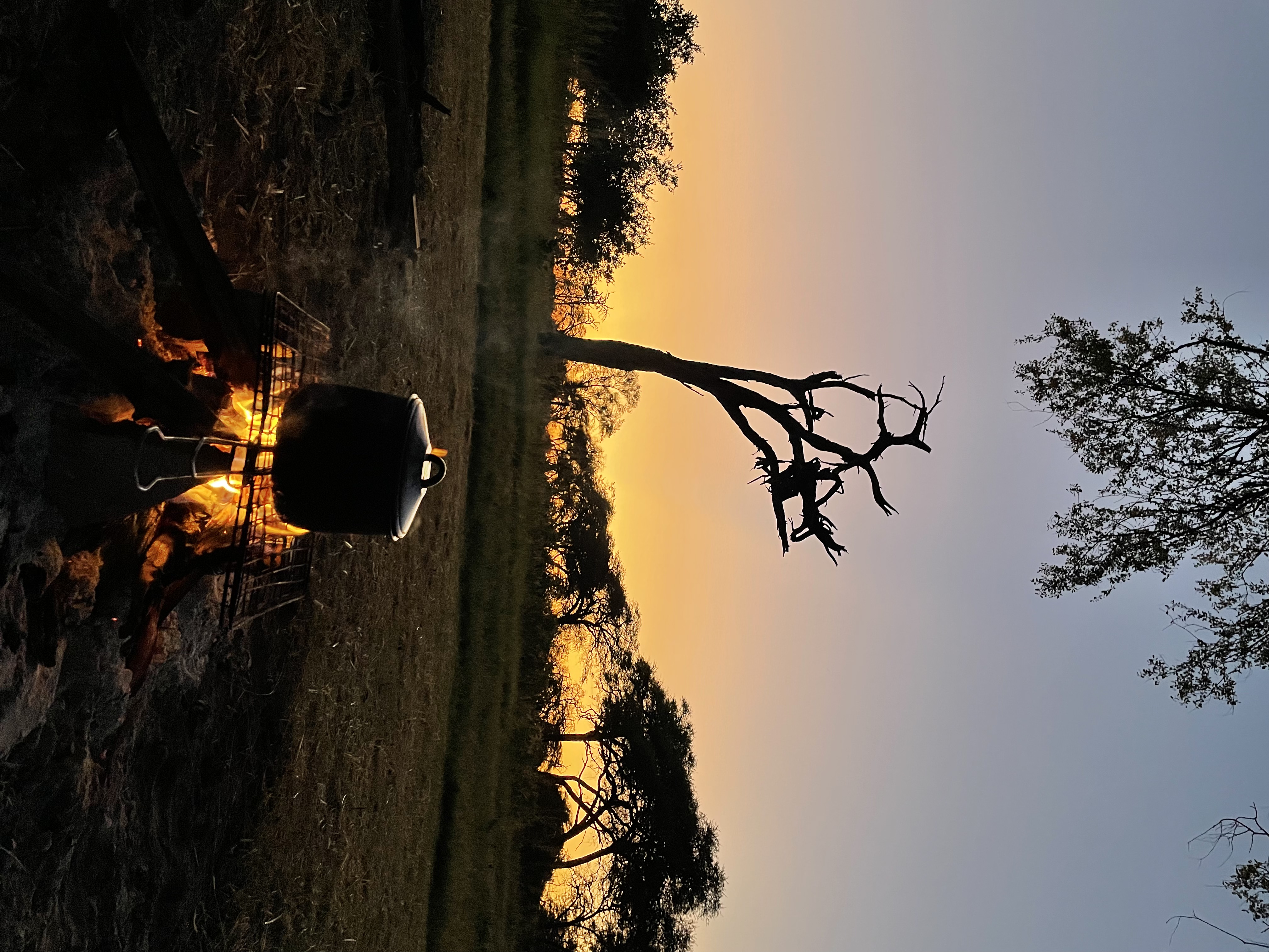 Josie and Adam: A campfire in the Okavango