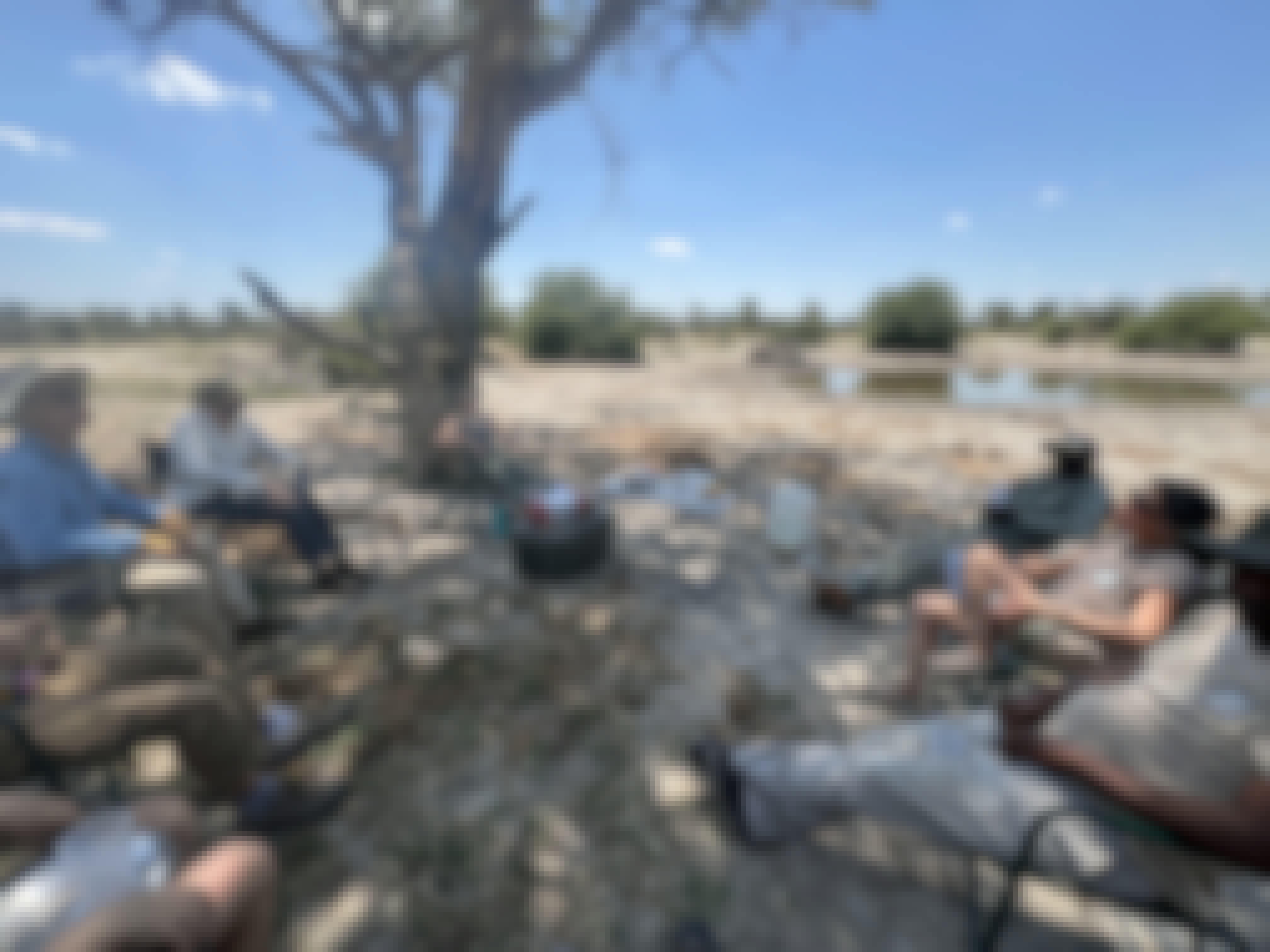 A volunteer relax in the shade in the the Okavango