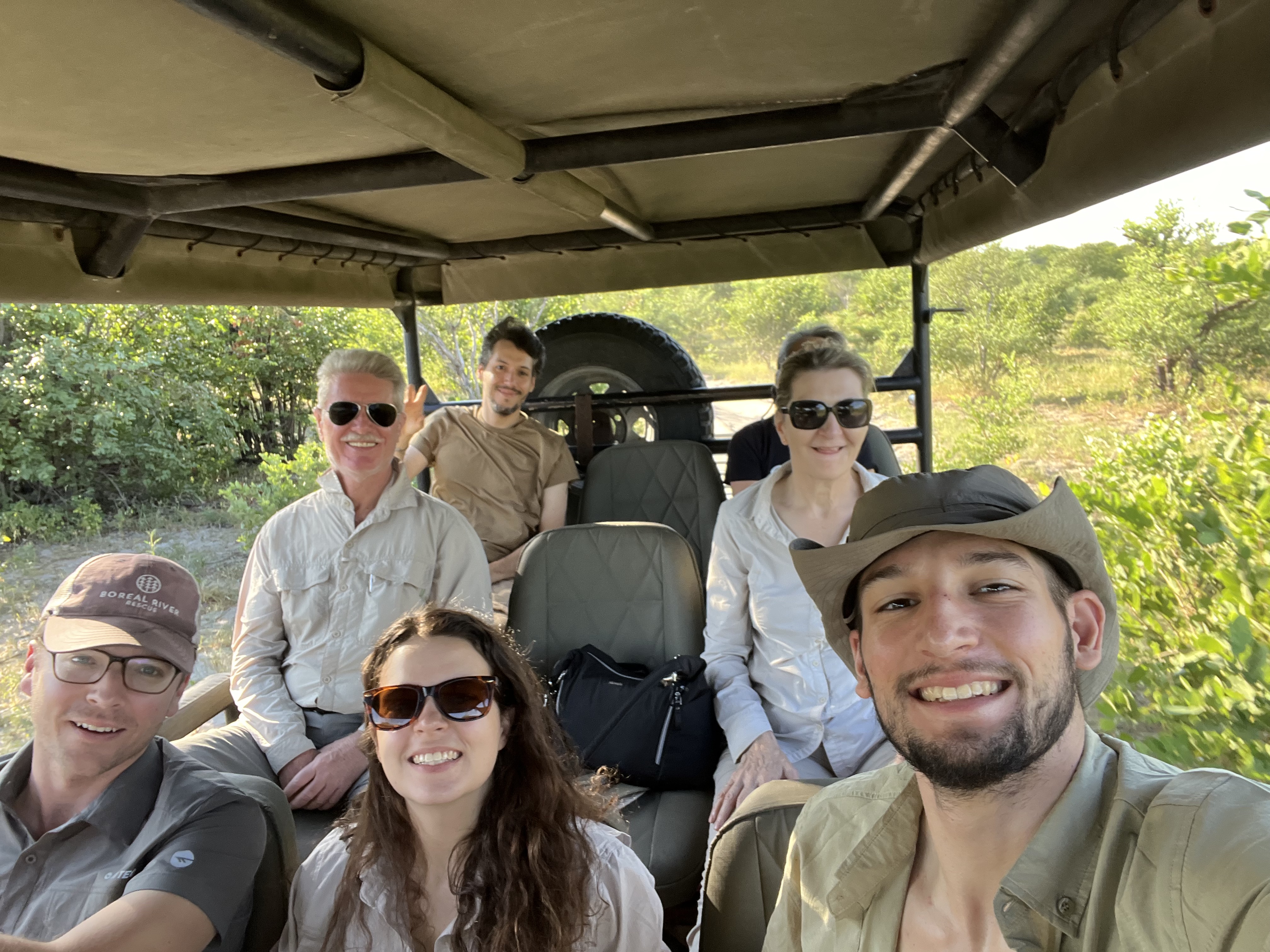 Josie and Adam: A group of volunteers in a vehicle in the the Okavango