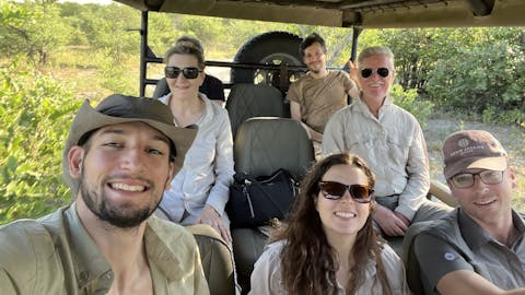Josie and Adam: A group of volunteers in a vehicle in the the Okavango