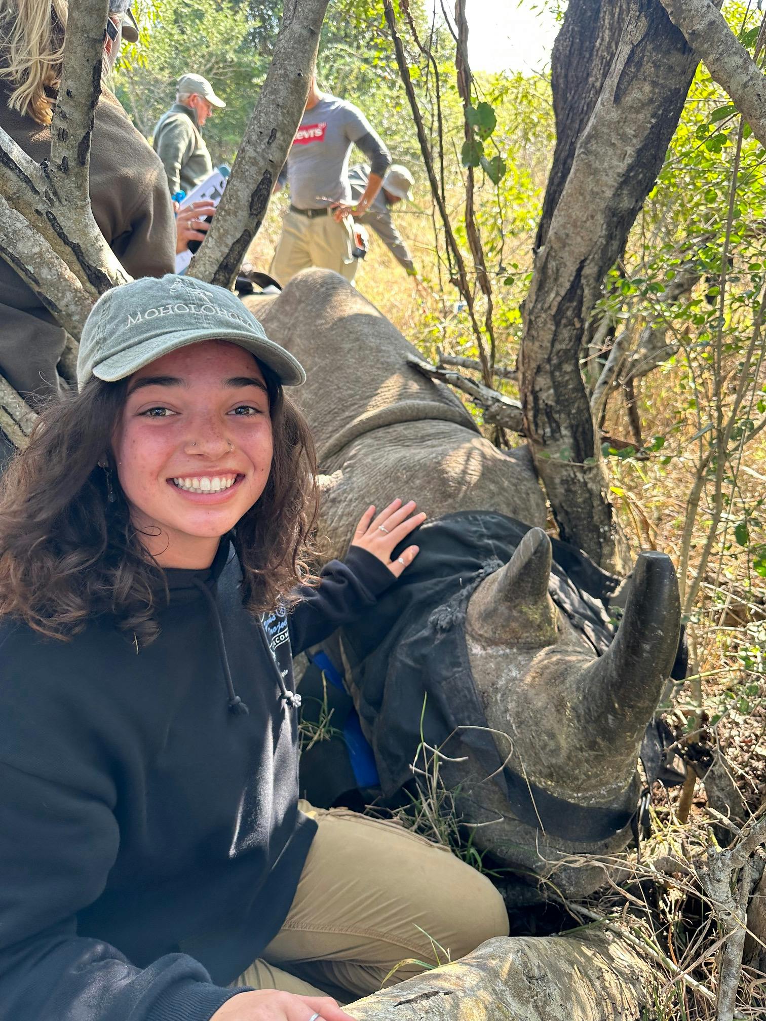 Payton McGarva: Student in front of a sedated rhino