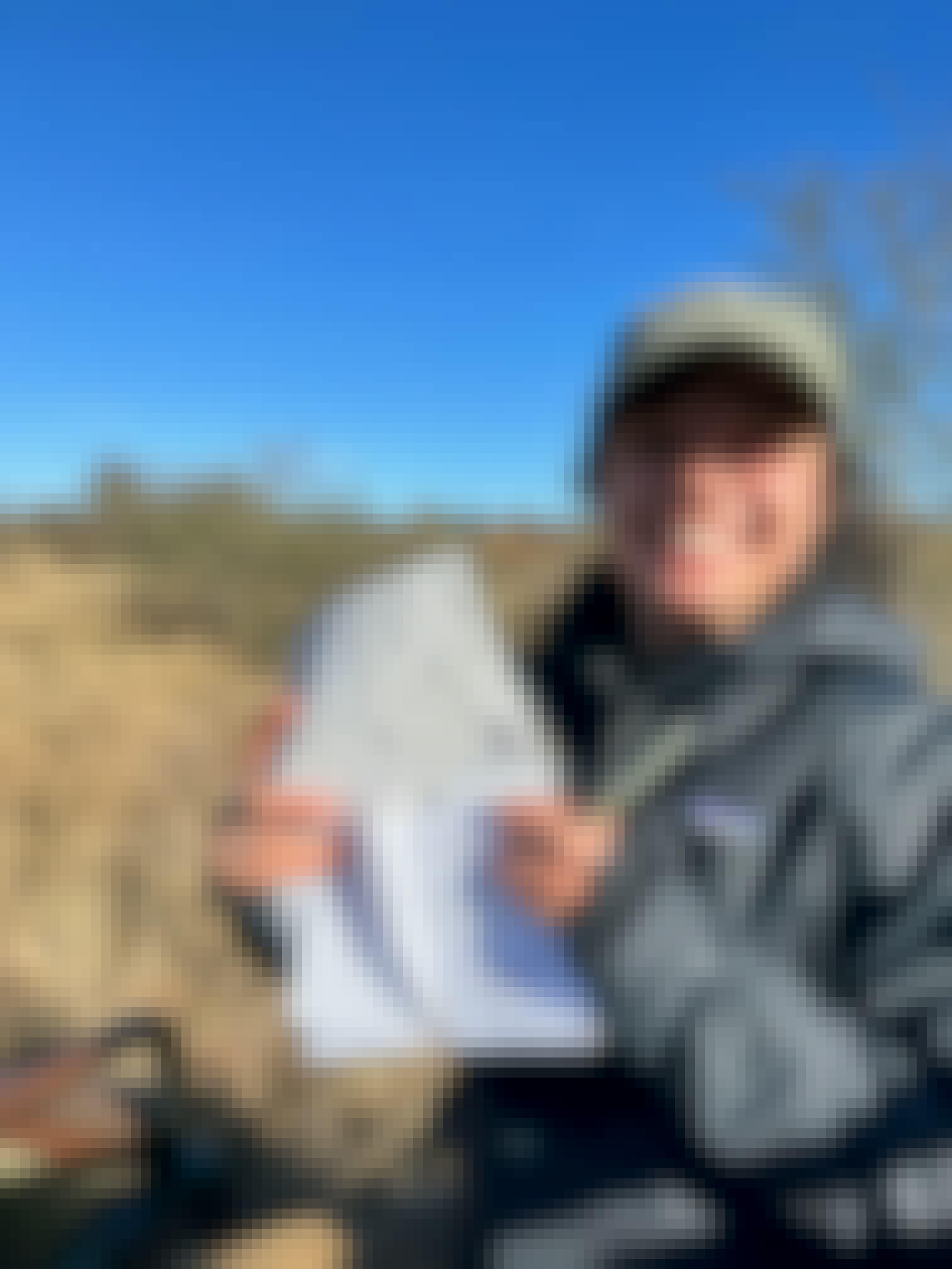 Payton McGarva: Student posing with a map