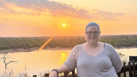 Kaitlyn Evans: a female student in front of a sunset