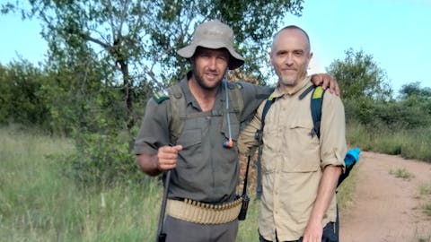 Michal Trawinski: Two men and a dog pose for the camera