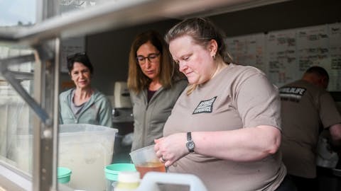 Terence and Victoria Fitzpatrick: preparing the food for the rhinos at Care for Wild Africa