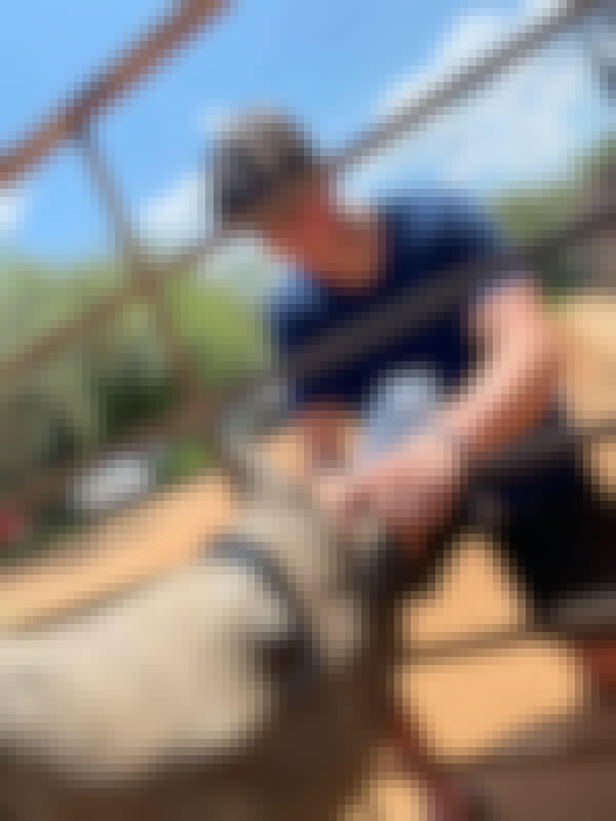Sam Thain: bottle feeding a rhino