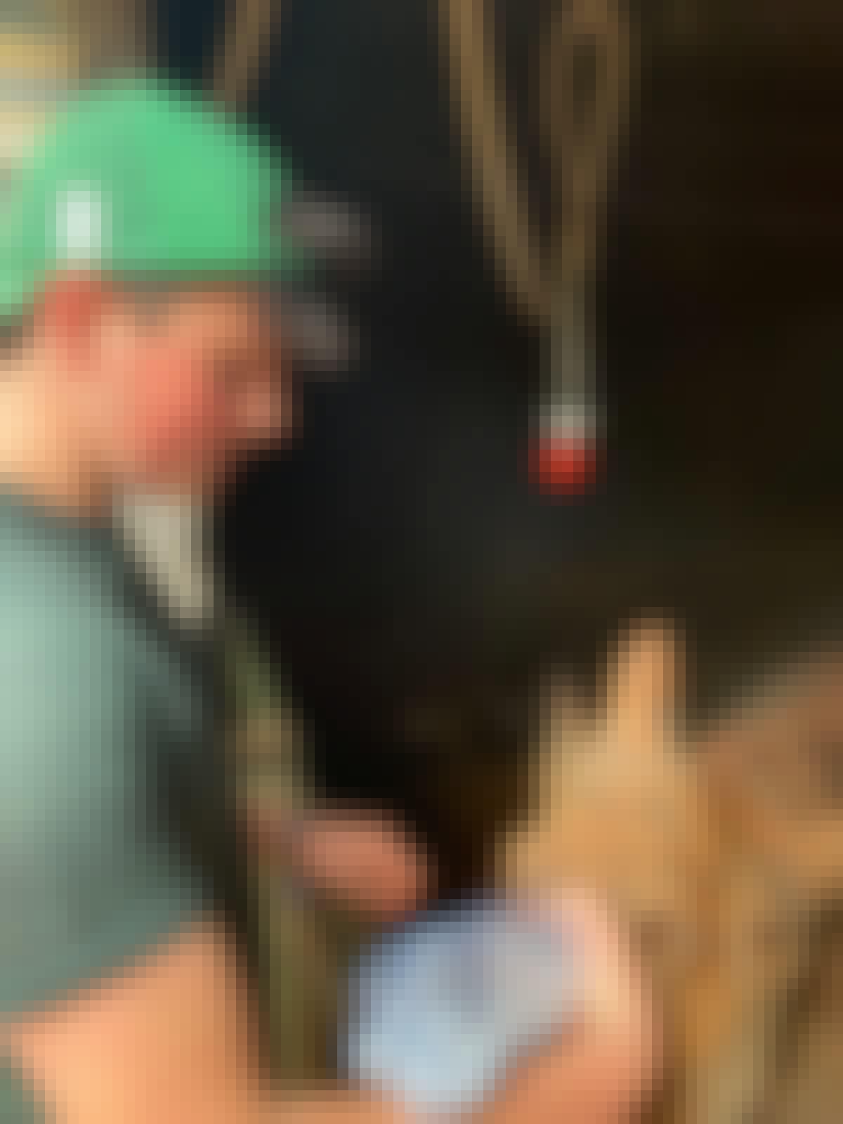 Sam Thain: bottle feeding a rhino