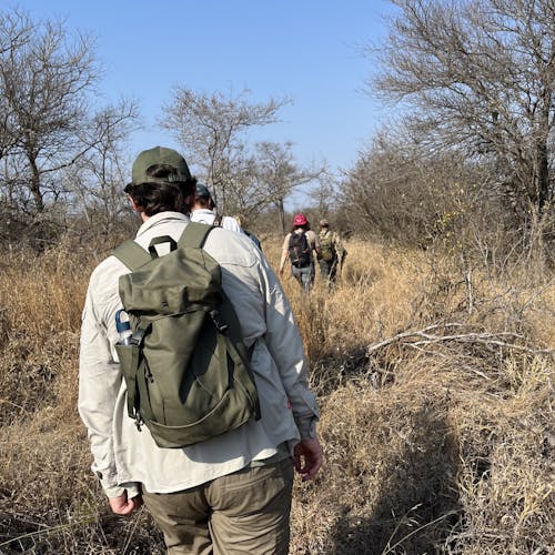 Liam Corcoran and Emily Munroe: hiking in the bush