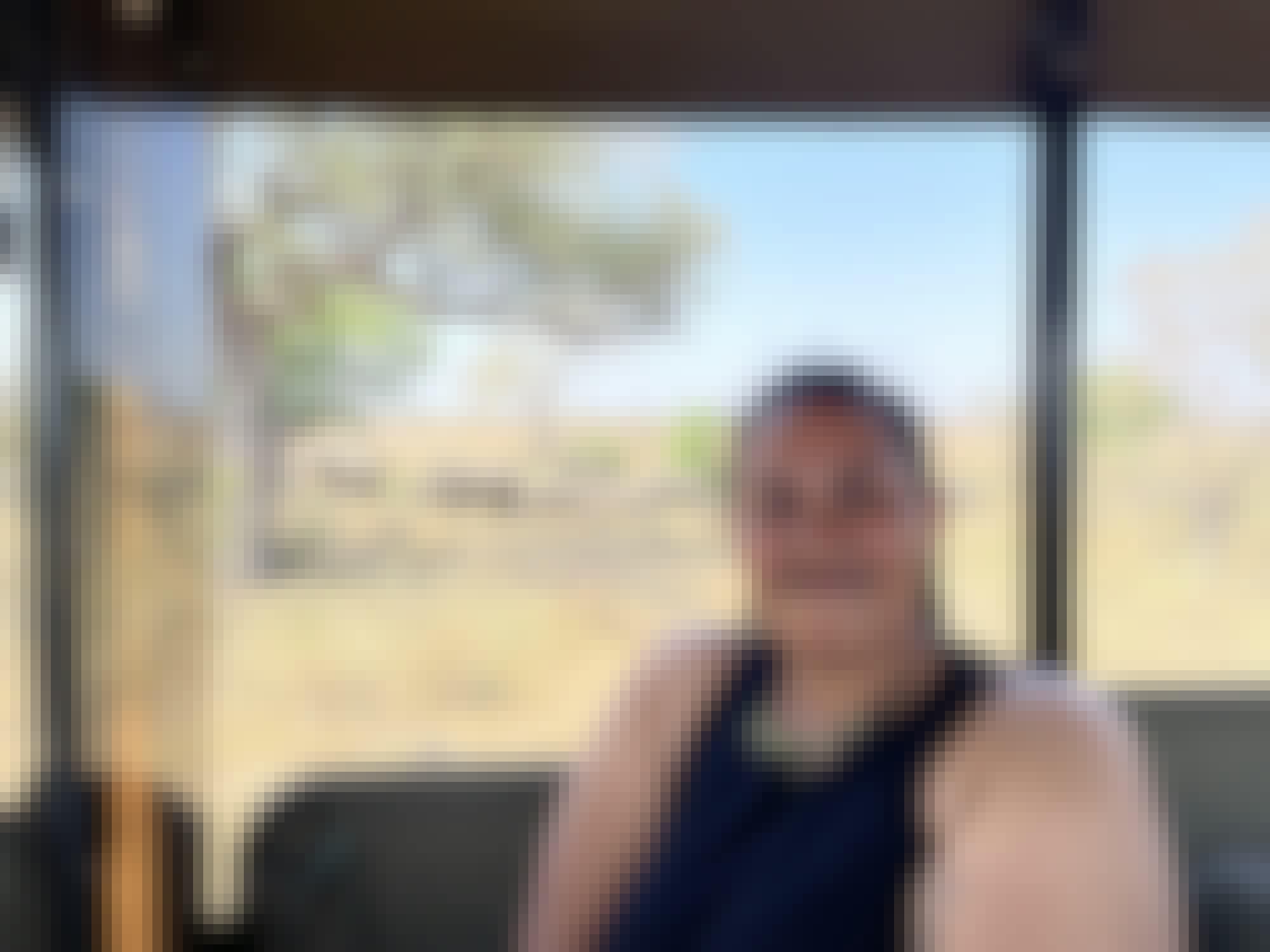 Liam Corcoran and Emily Munroe: in vehicle with elephants in the background