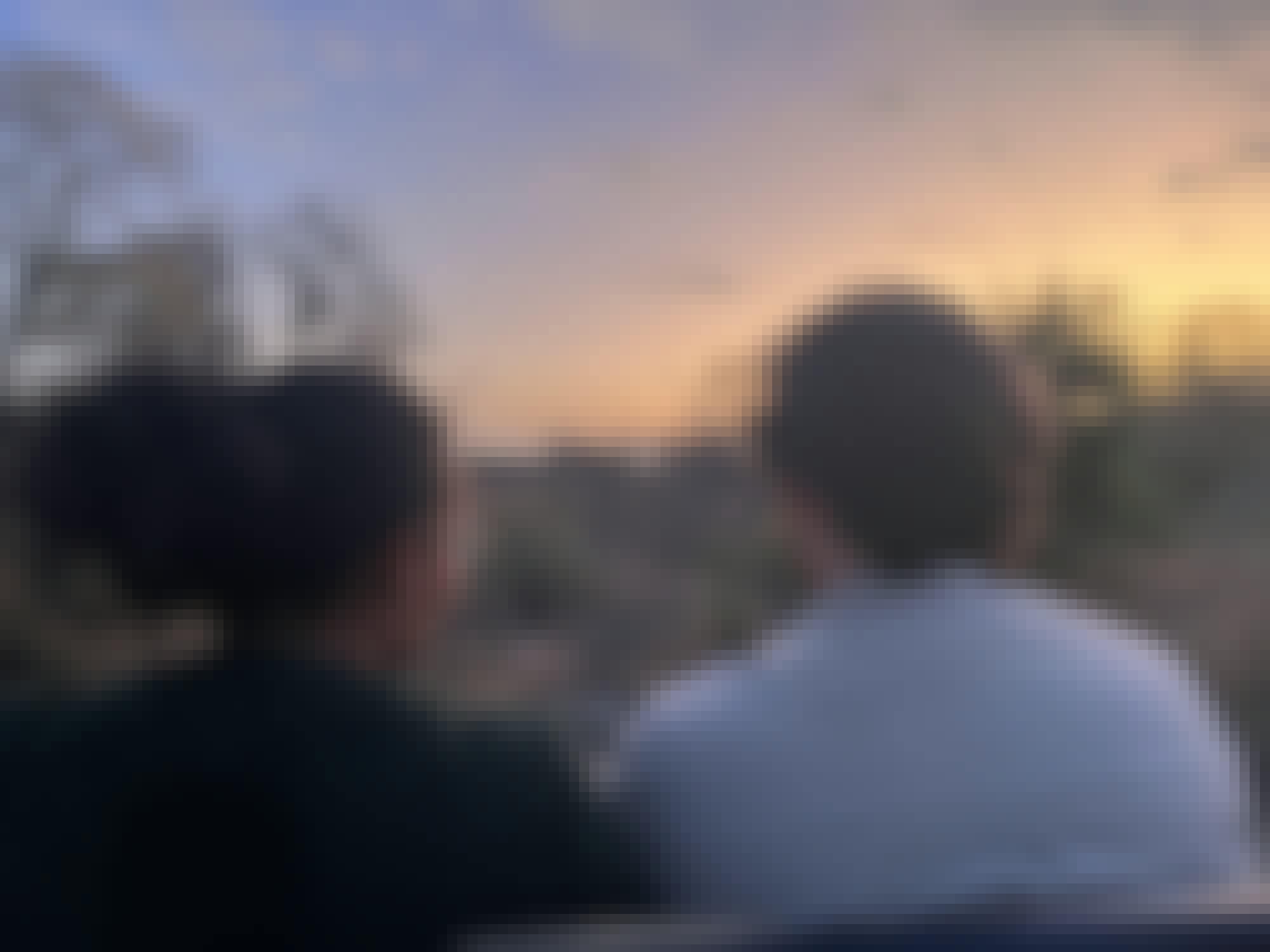 Liam Corcoran and Emily Munroe: on the vehicle in the sunset