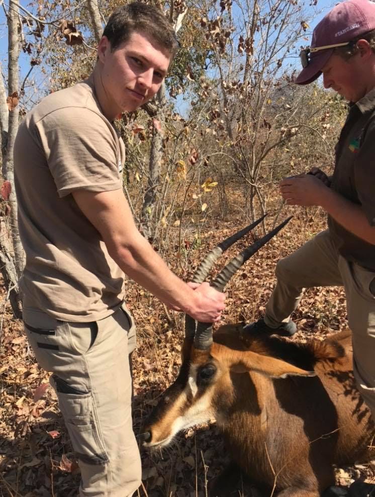 Jesse Burgess: posing with an antelope