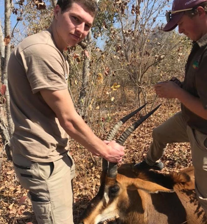 Jesse Burgess: posing with an antelope