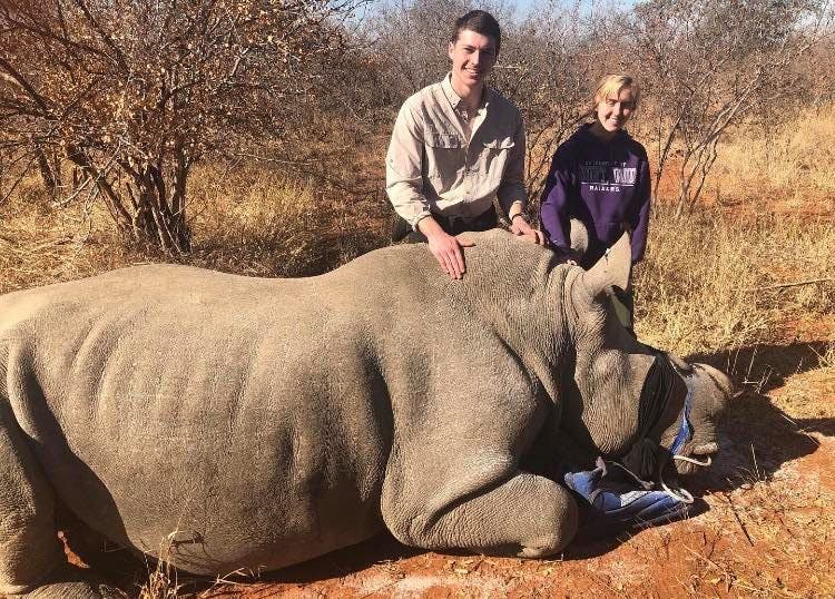 Jesse Burgess: posing with a sedated rhino