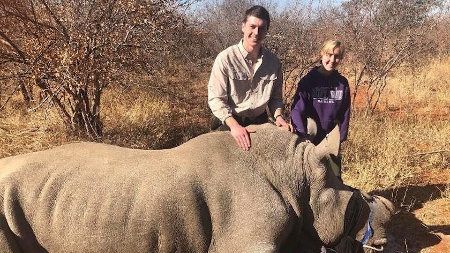 Jesse Burgess: posing with a sedated rhino