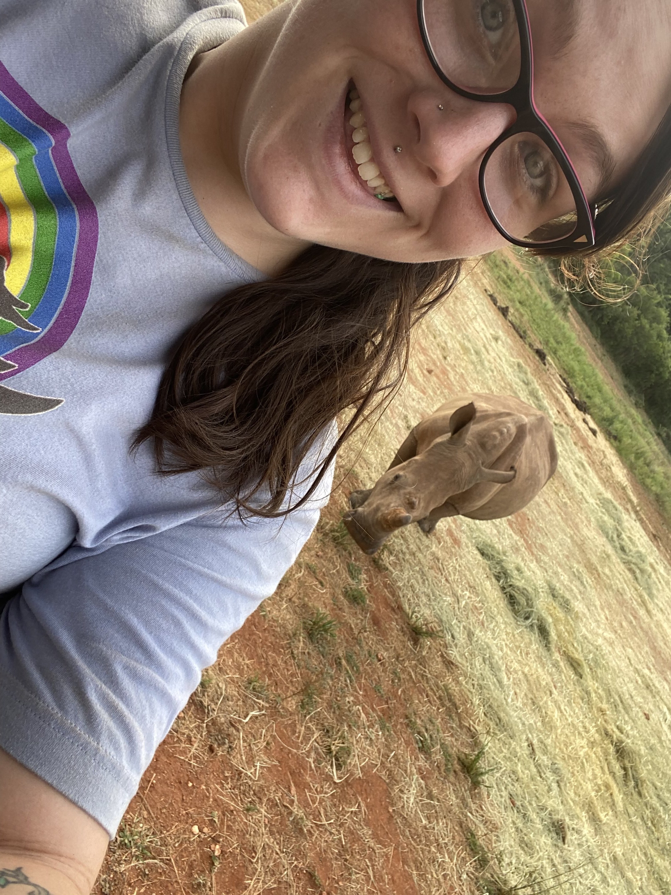 Chandra Kelton: baby rhino in the background