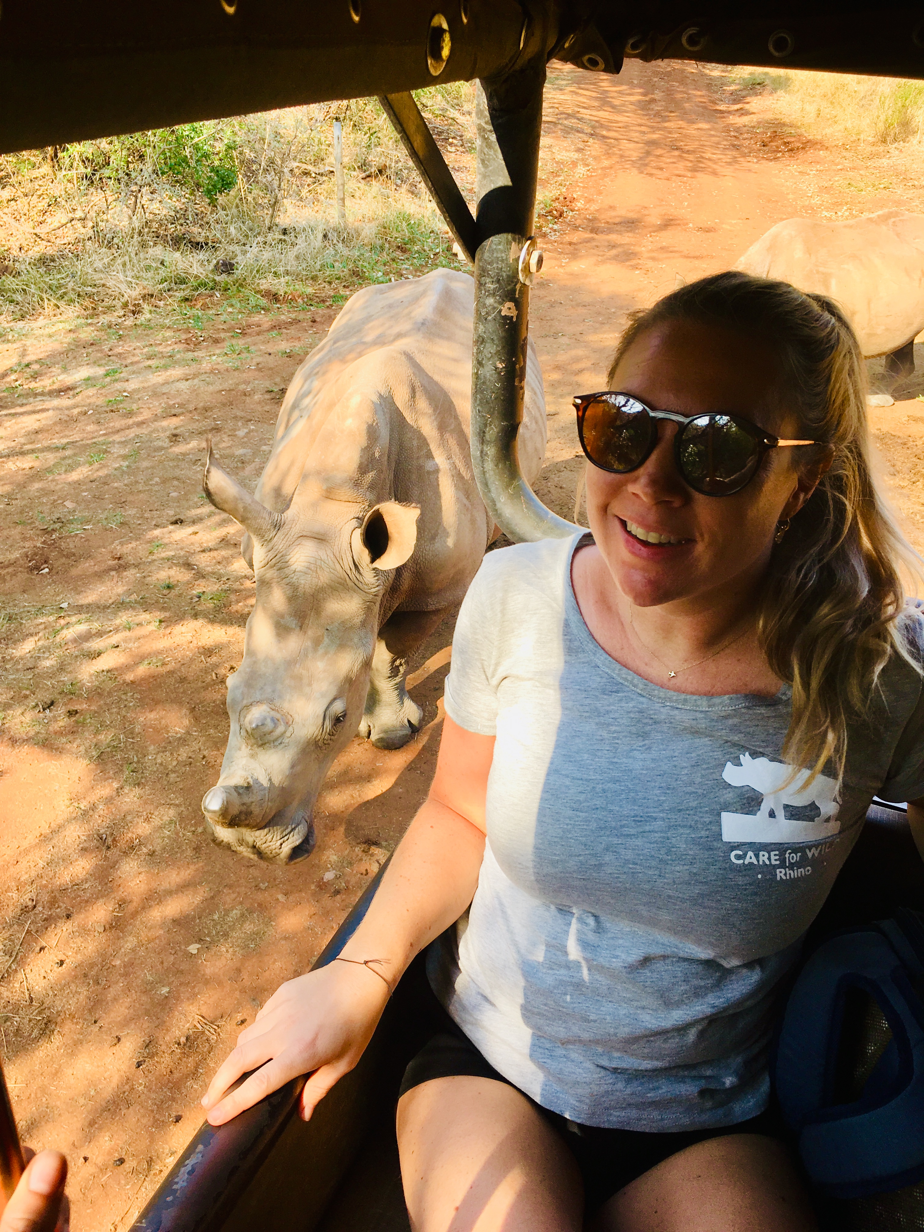 Maartje van Vlerken: posing with a rhino following the vehicle