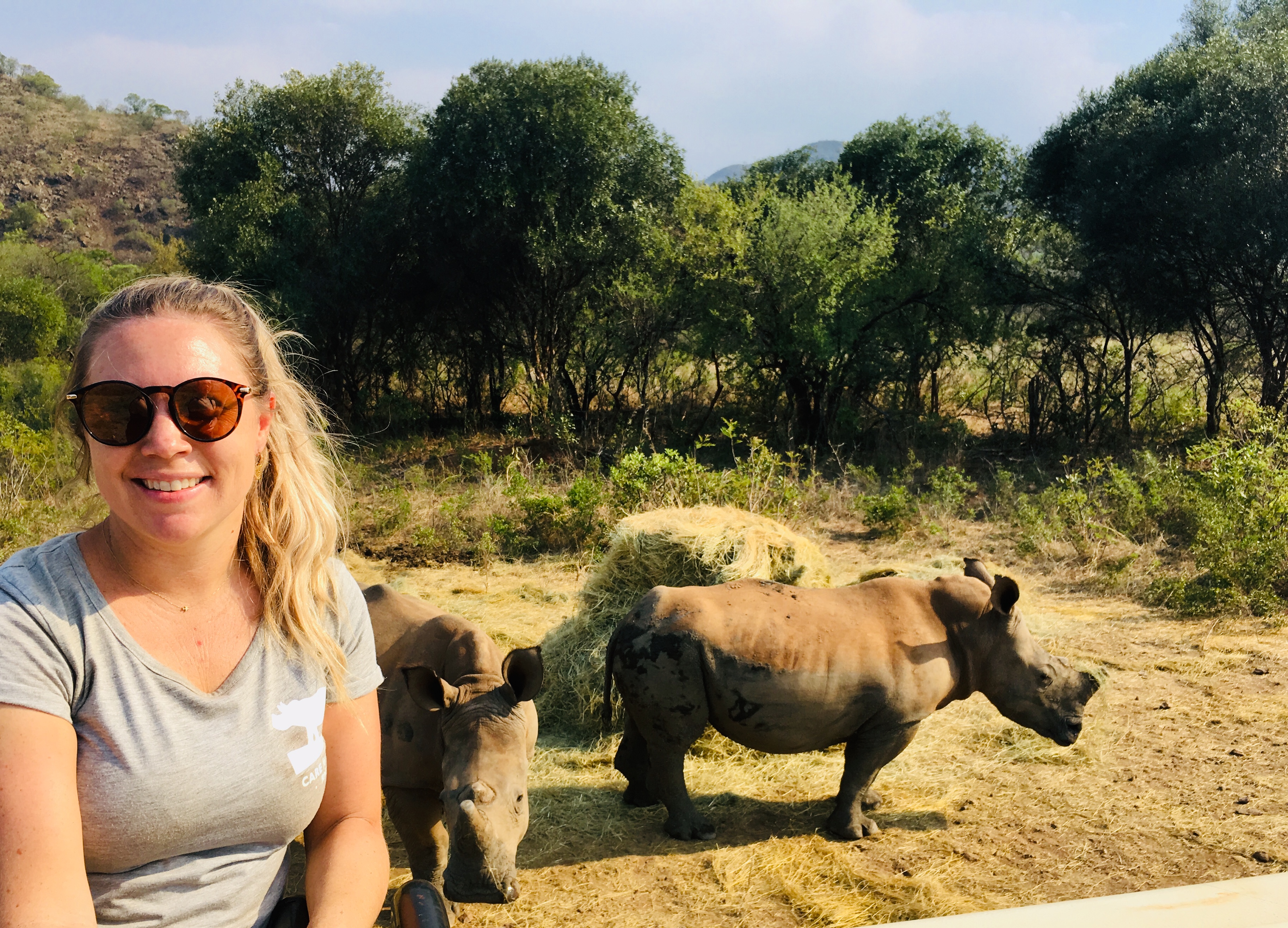 Maartje van Vlerken: posing with rhinos in the background
