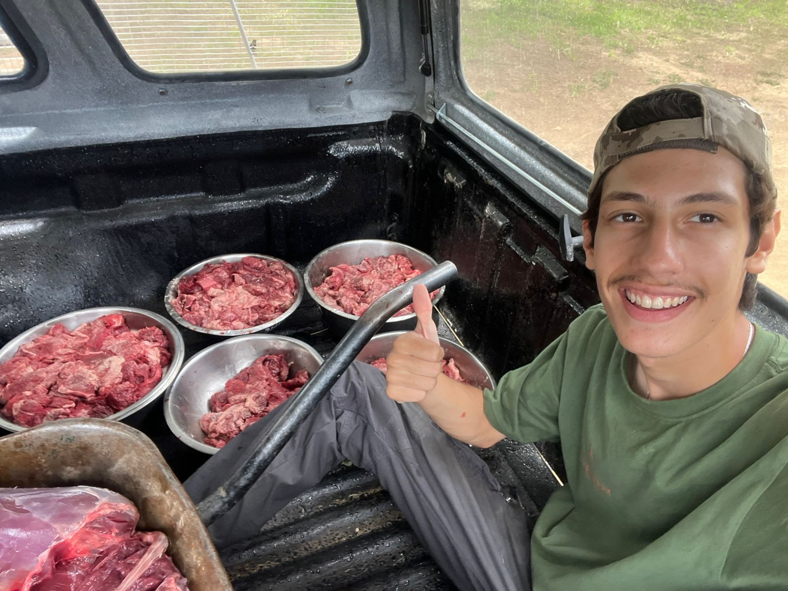 João de Oliveira: male volunteer posing with carnivore food 
