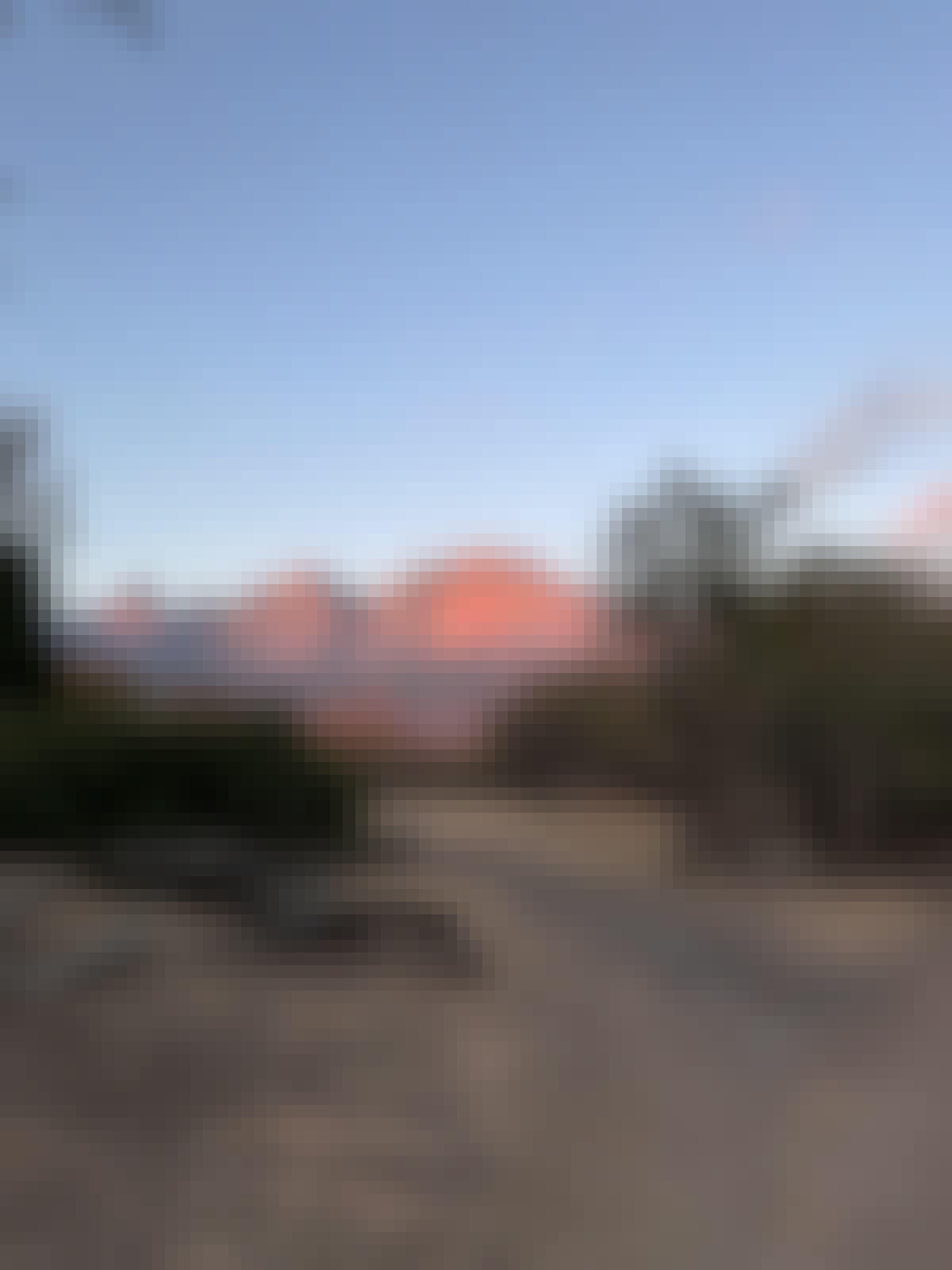 Adam Peerally: sunrise against a mountain