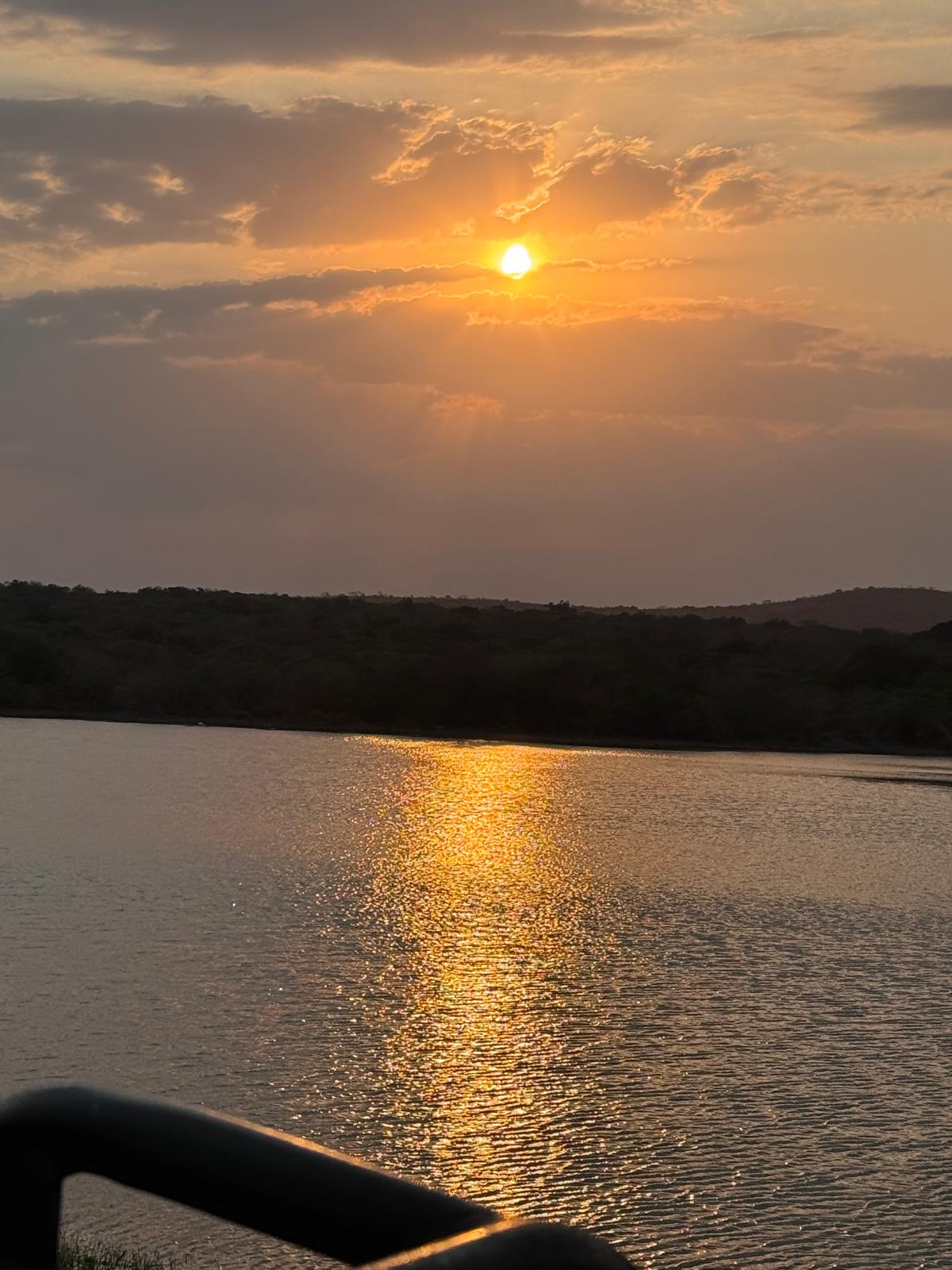 Adam Peerally: sunset over the river