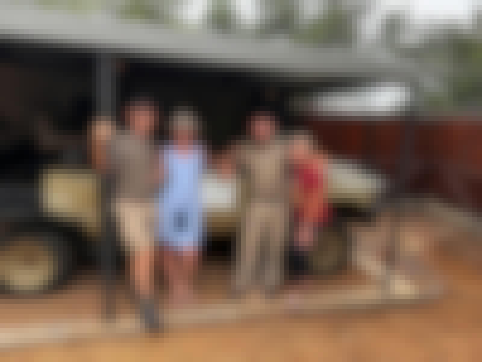 Carrie Roussin: volunteers posing with a guide and researcher