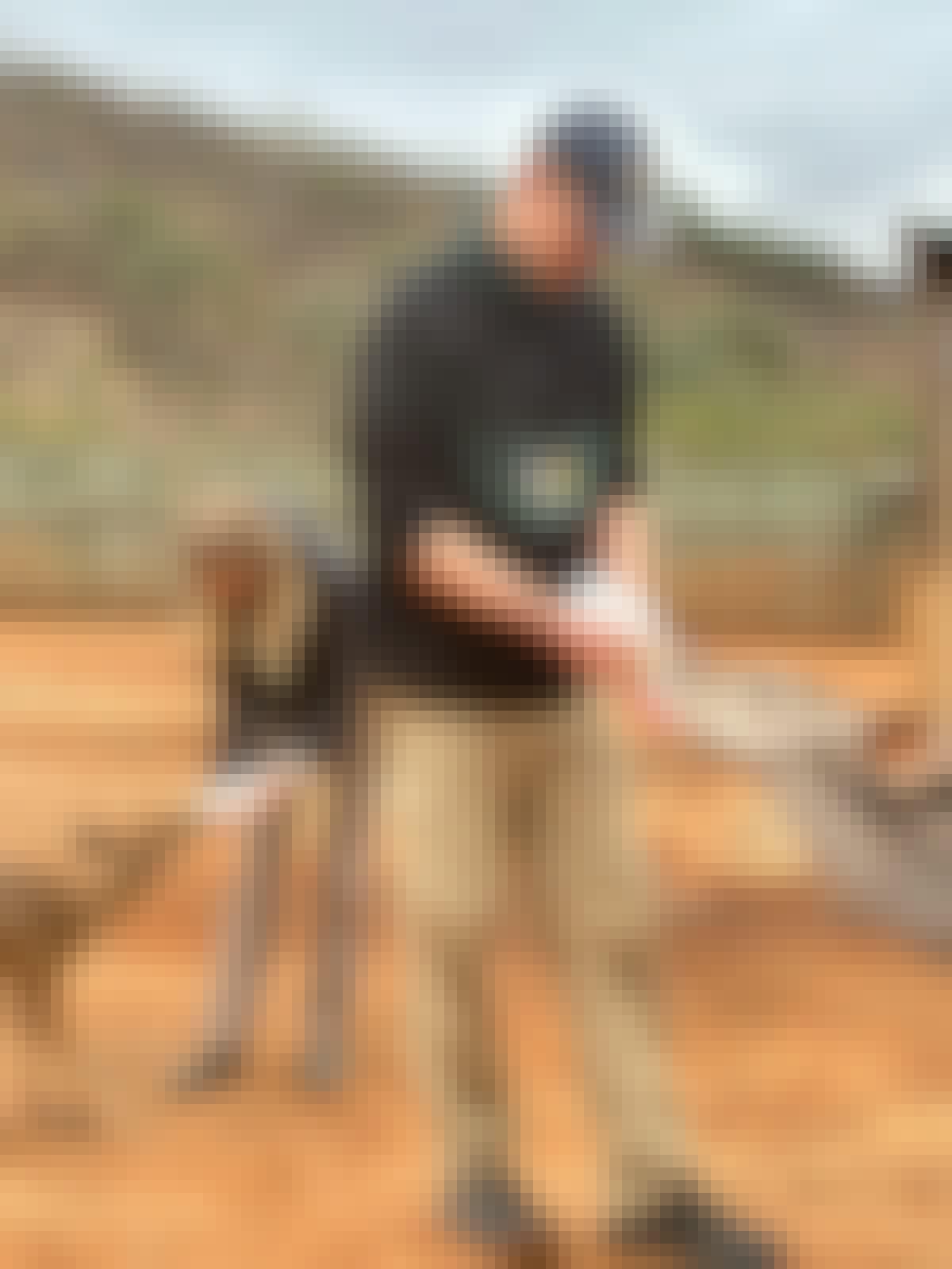 Matthew Gregory: male volunteer feeding baby deer
