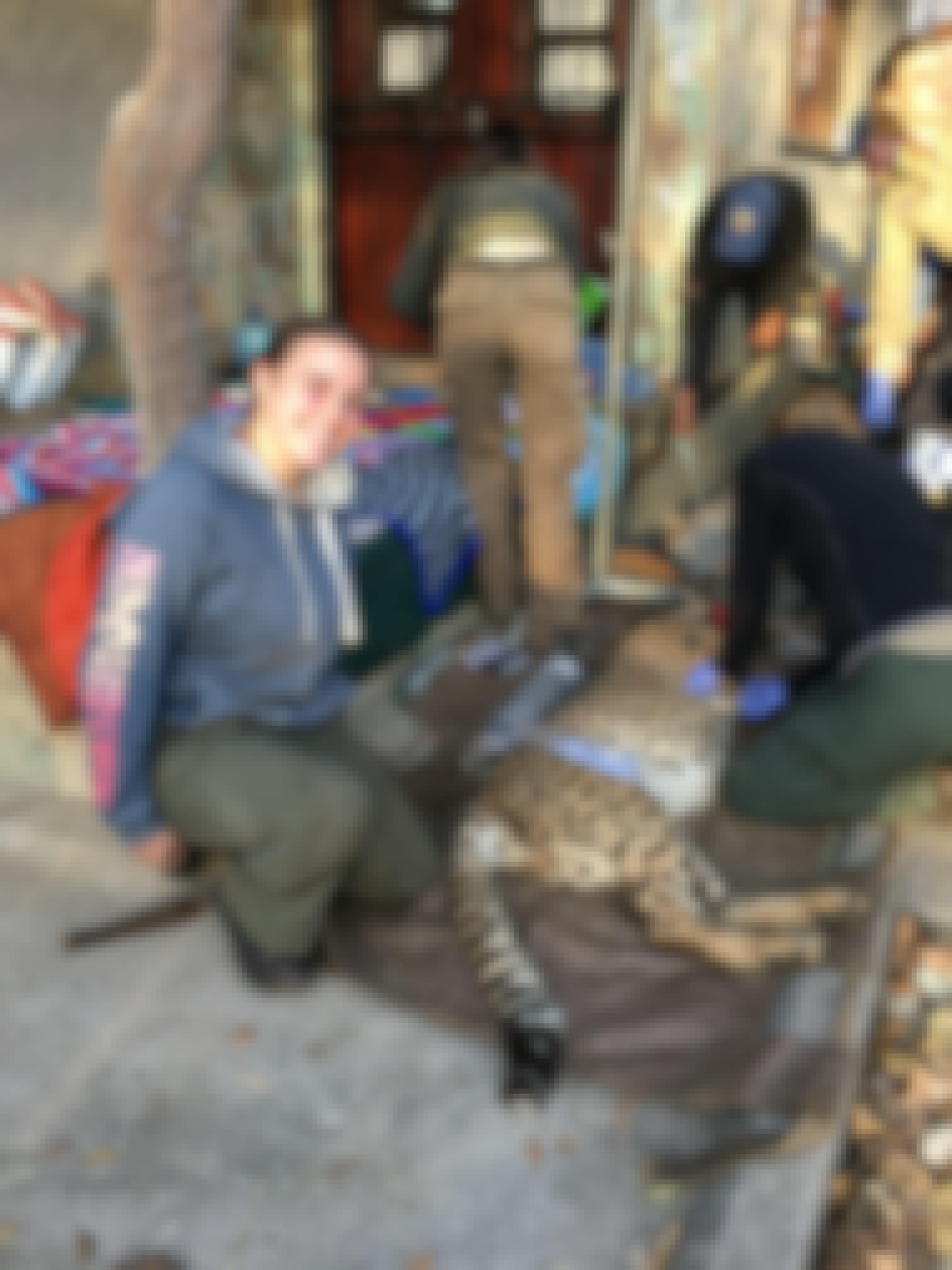 Caitlin Bayliss: female veterinary volunteer posing with cheetah 