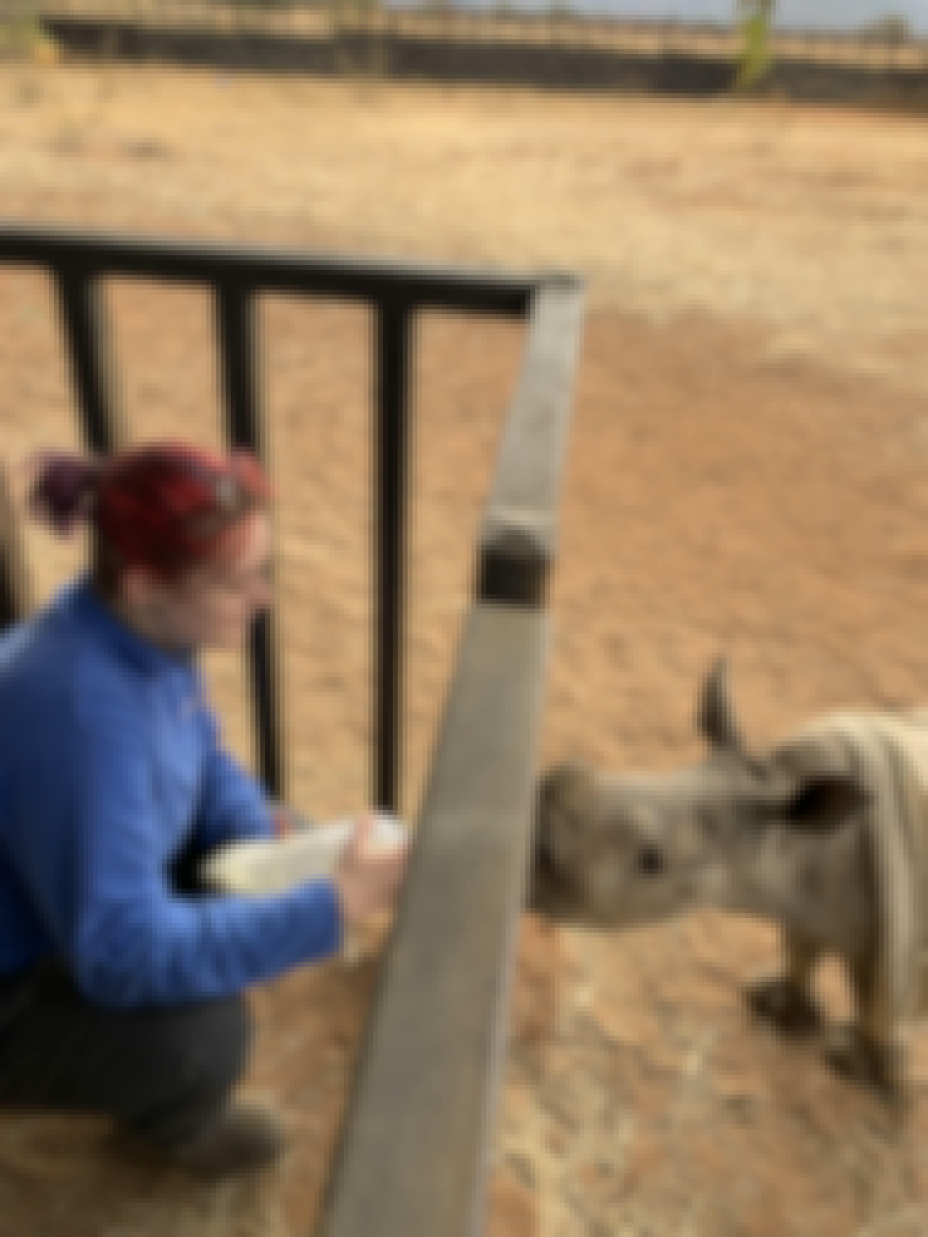 Evie Ancell: female volunteer feeding baby rhino
