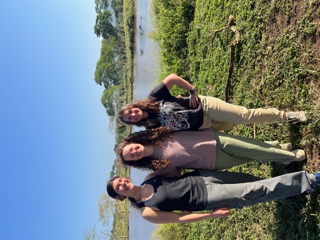 Olivia Shrimpton: a group of volunteers by a lake at Phinda 