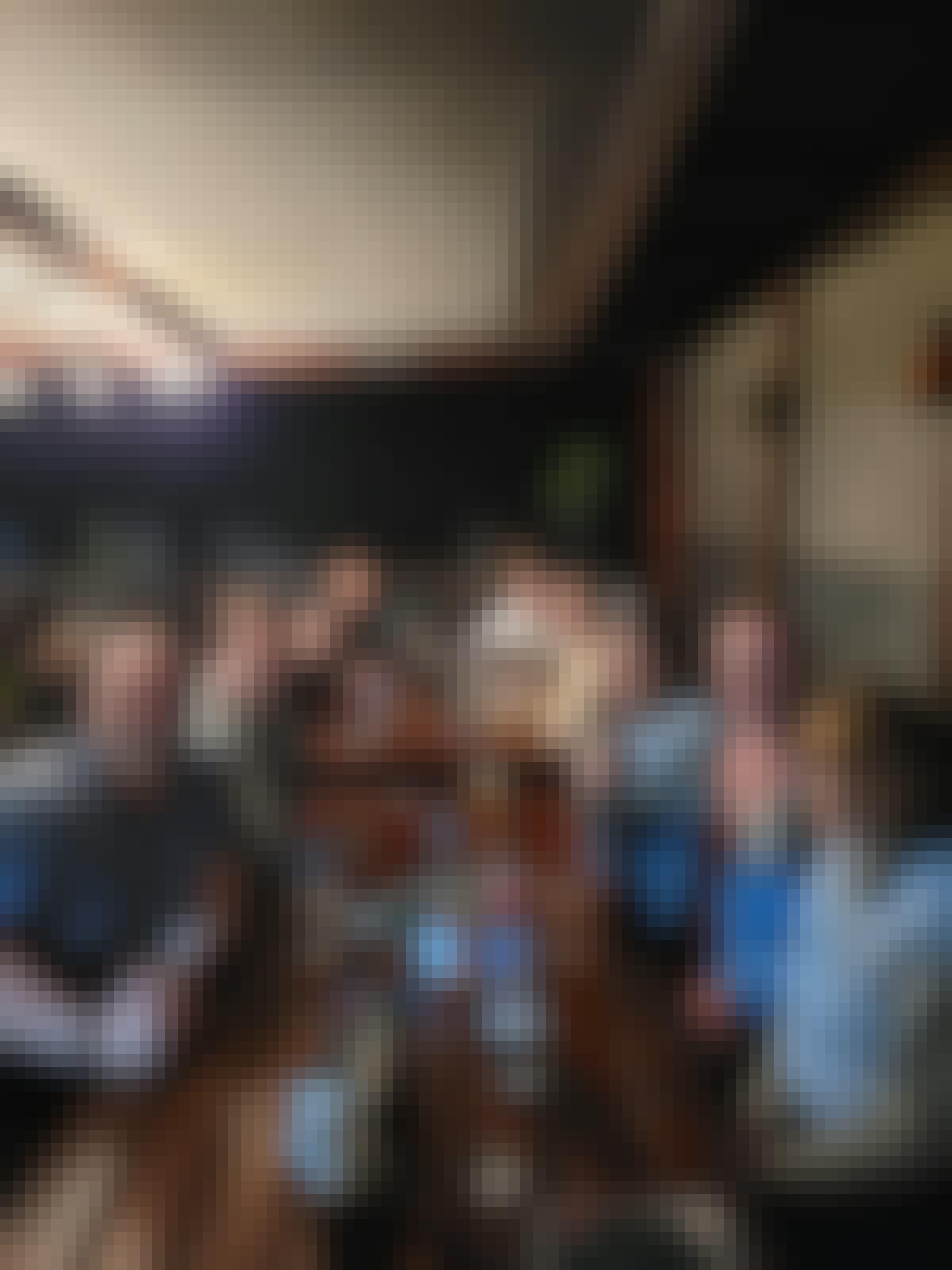 Sam Duggan: group posing drinking