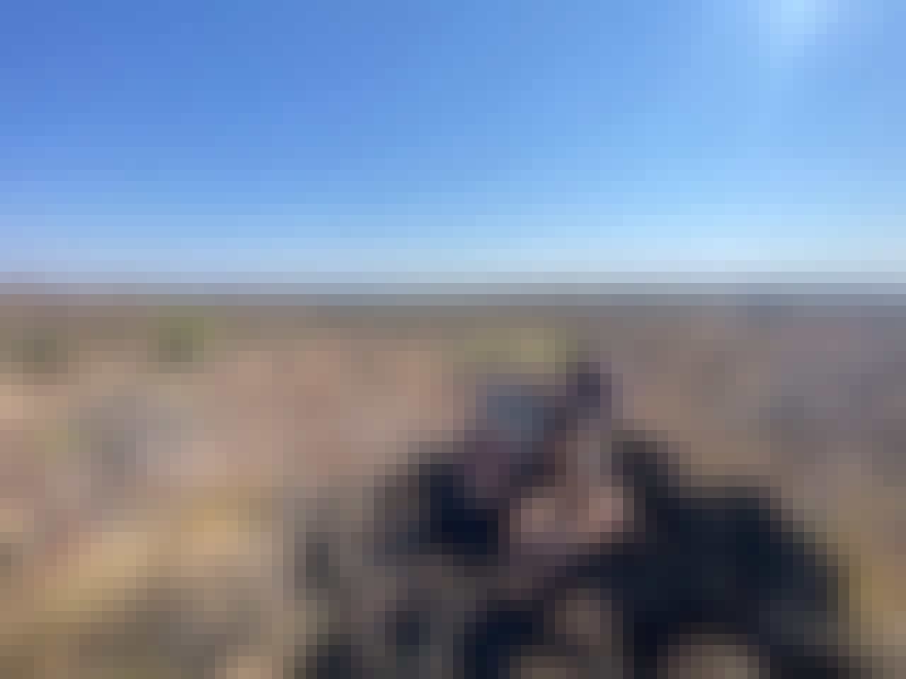 Sam Duggan: volunteer group posing landscape