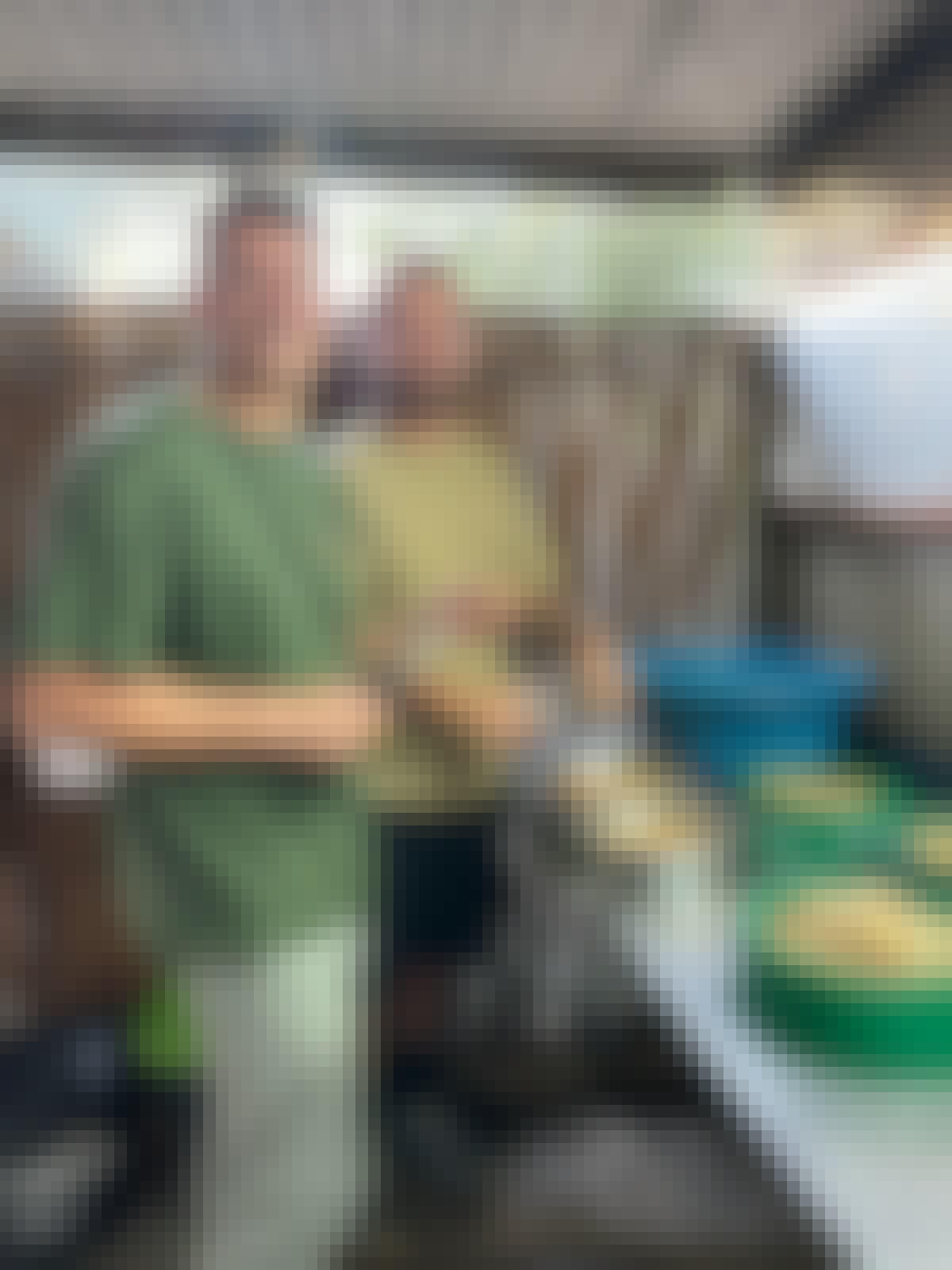 Sam Duggan: male volunteer preparing food