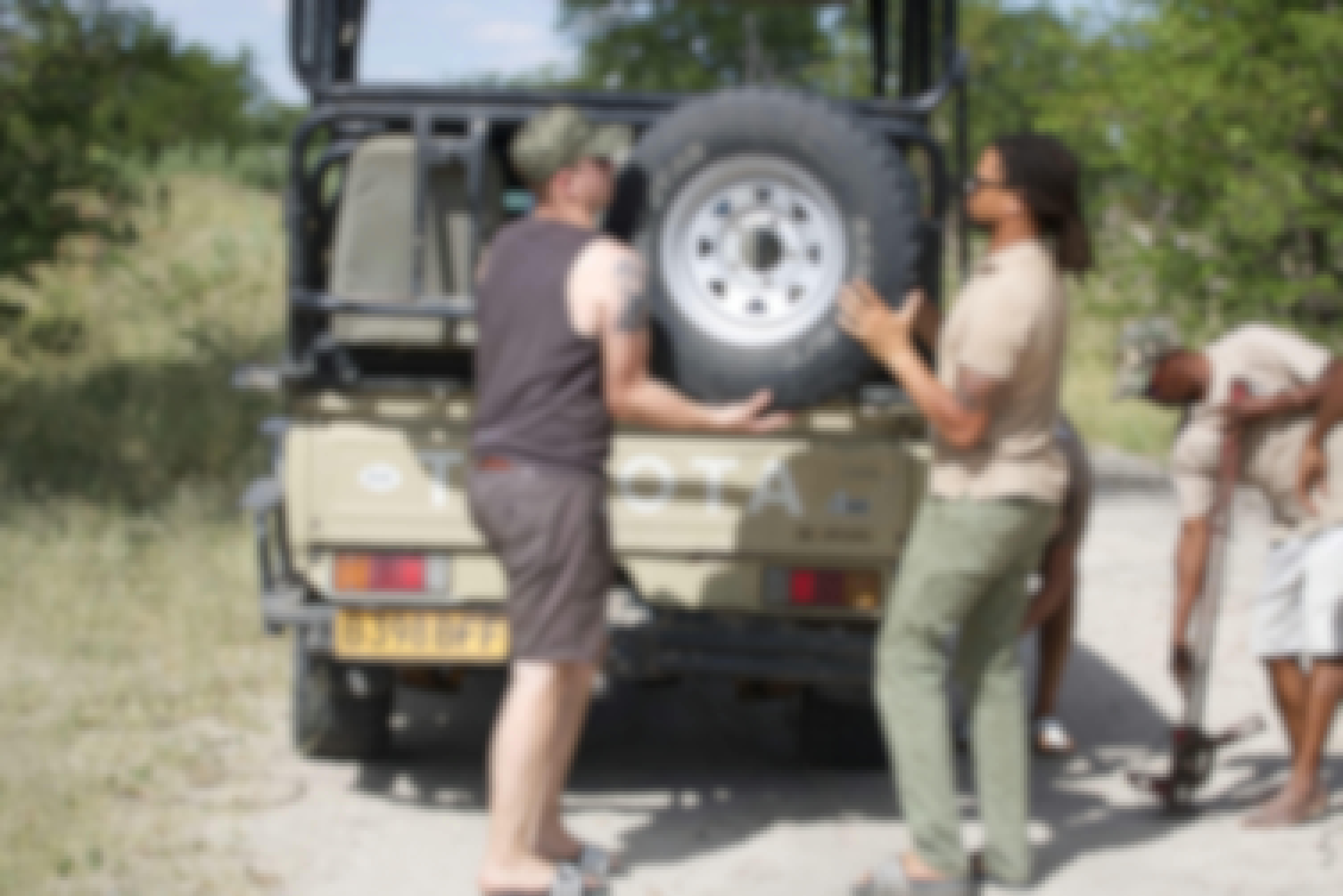 Ramez Ramzy: group beside the vehicle