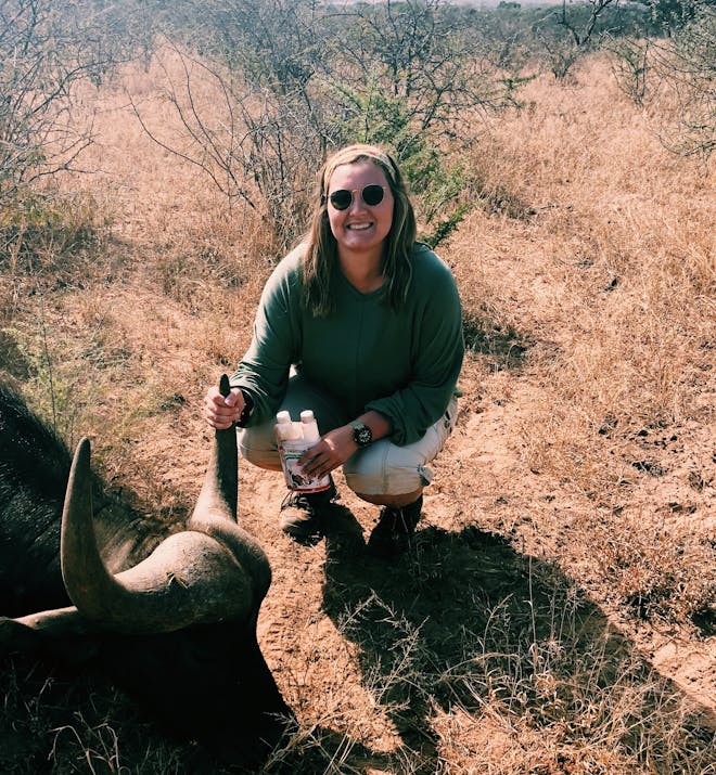 Micaela Chaffin: posing with a sedated buffalo