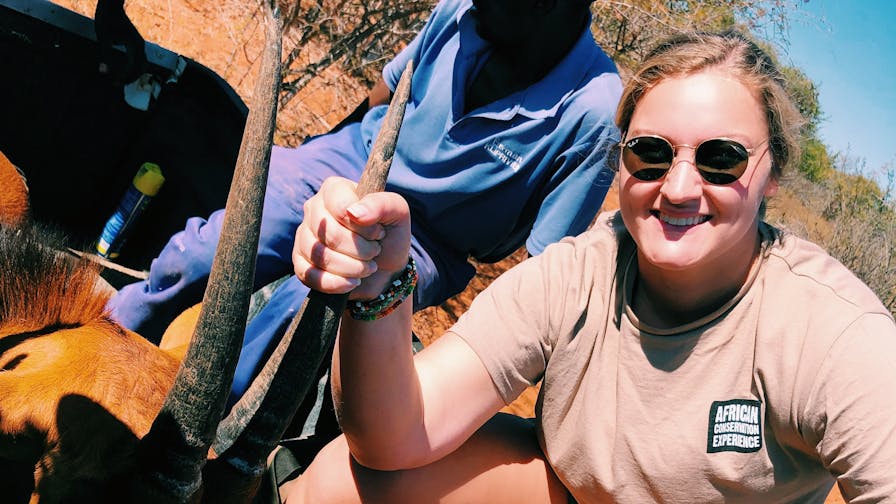 Micaela Chaffin: posing with an antelope