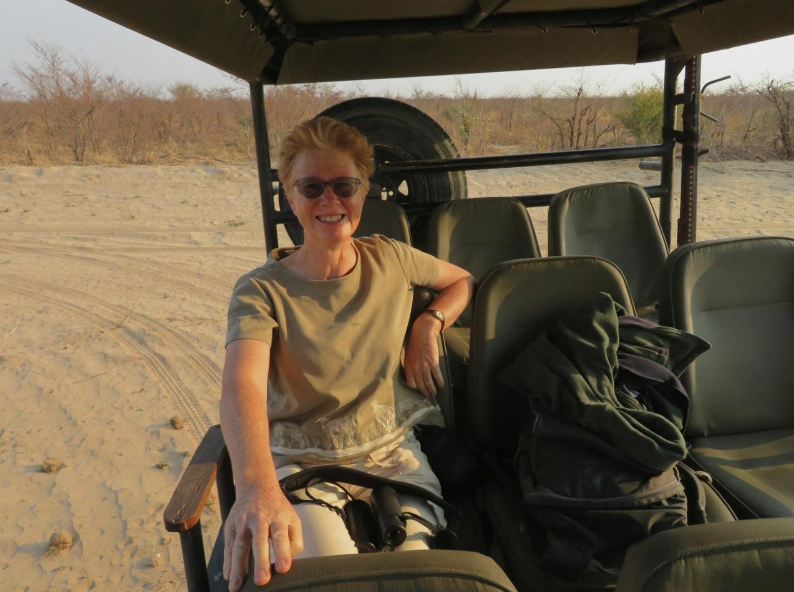 Rebecca Bower: posing in a vehicle
