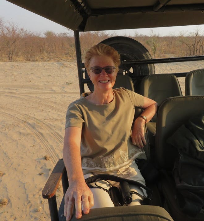 Rebecca Bower: posing in a vehicle