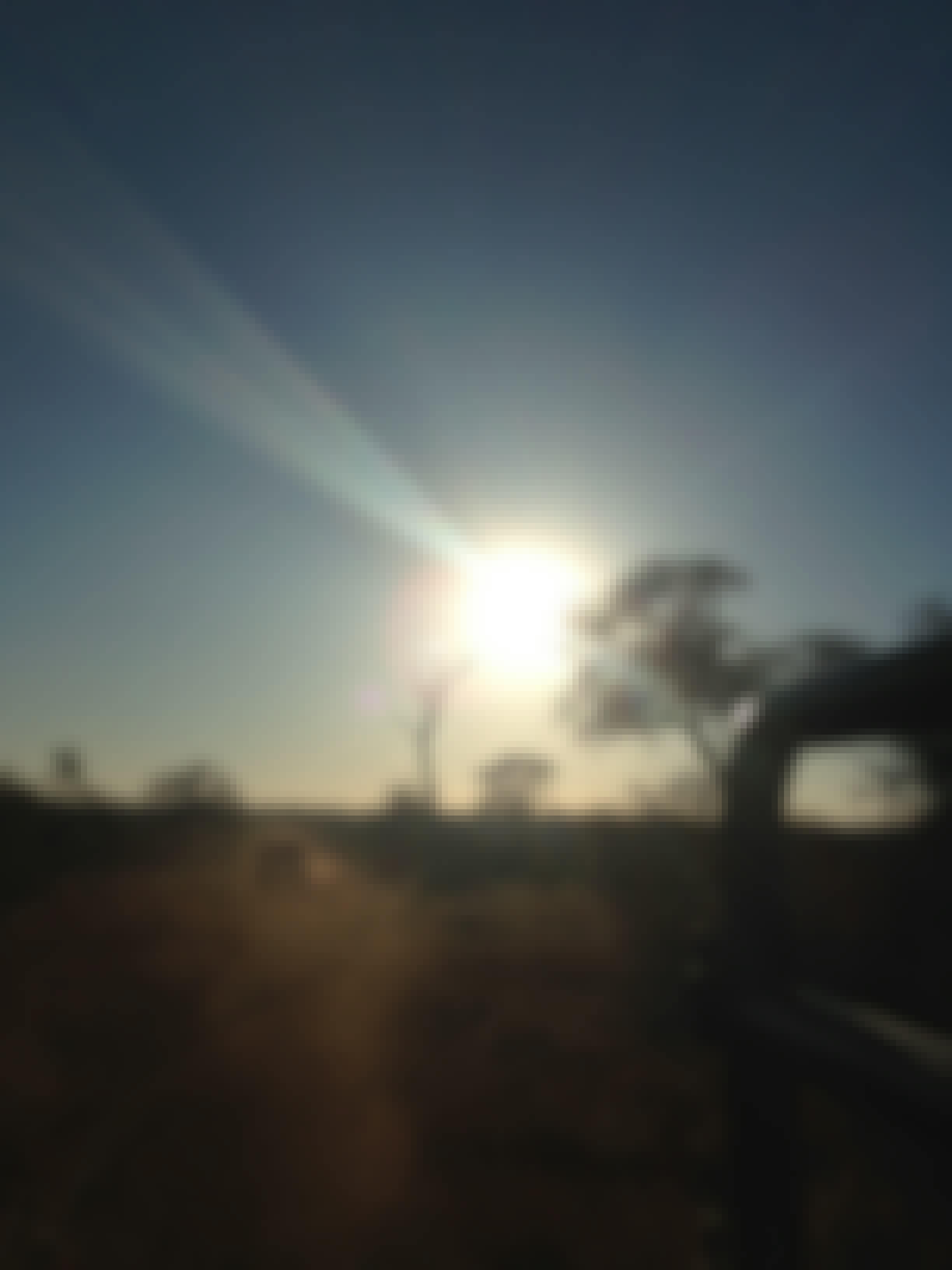Sophie Gates: sunset from a vehicle