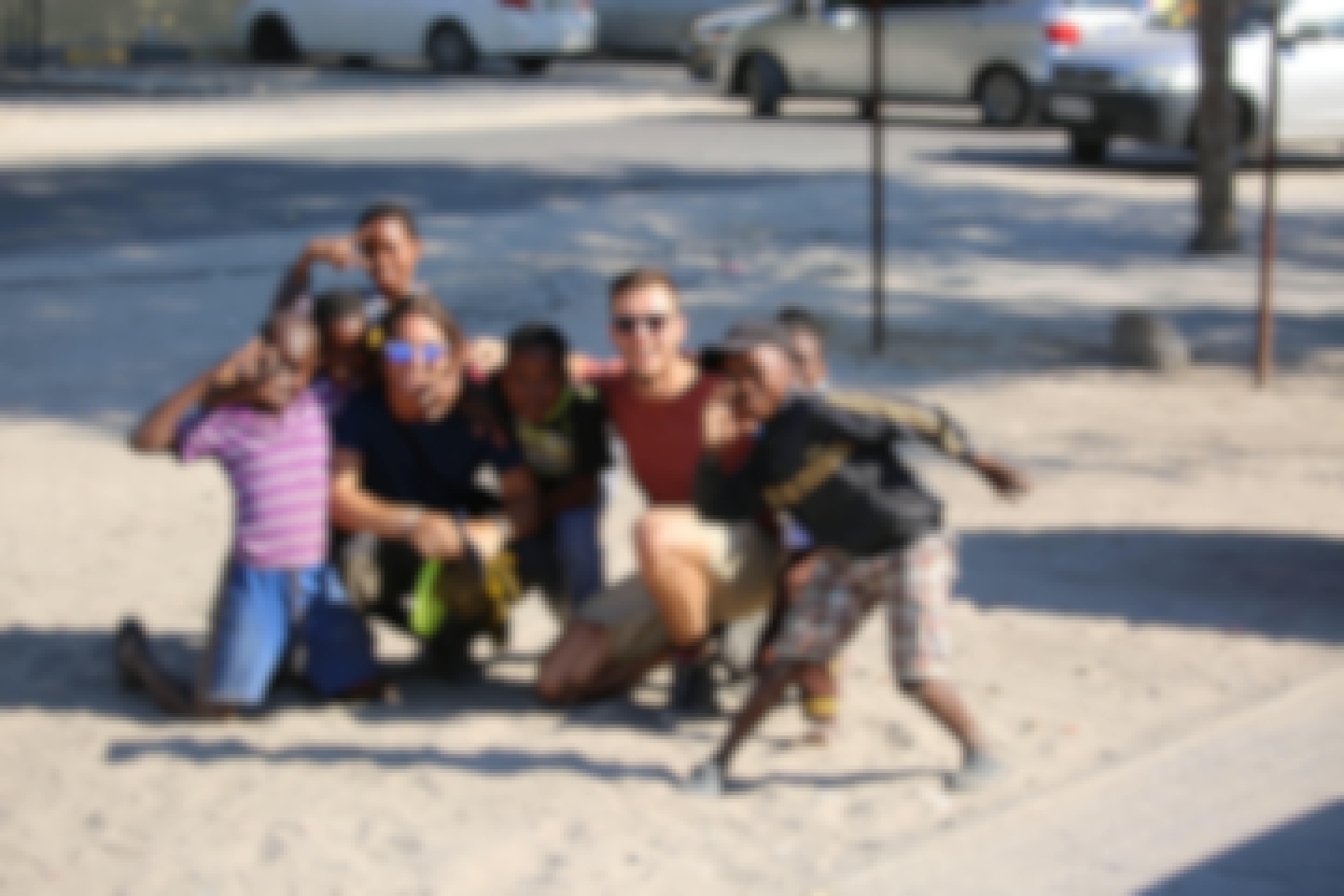 Miguel de Cruylles: volunteers posing with local community children