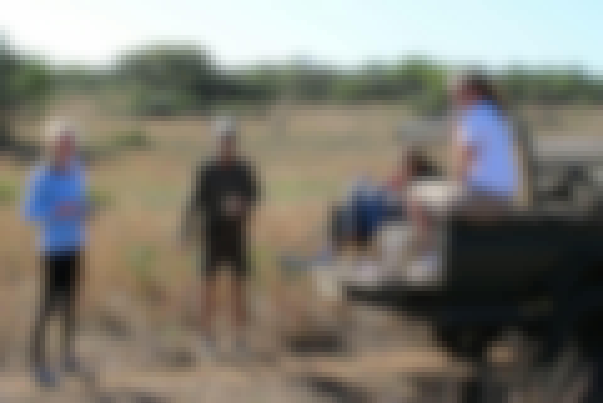 Victoria Neild: relaxing with other volunteers with the vehicle
