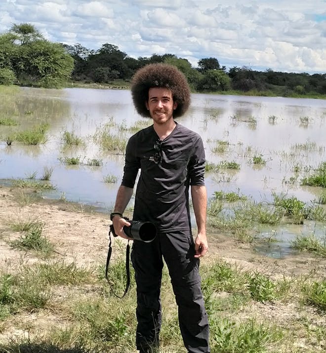 Tomer Admon: posing beside the water in the Okavango
