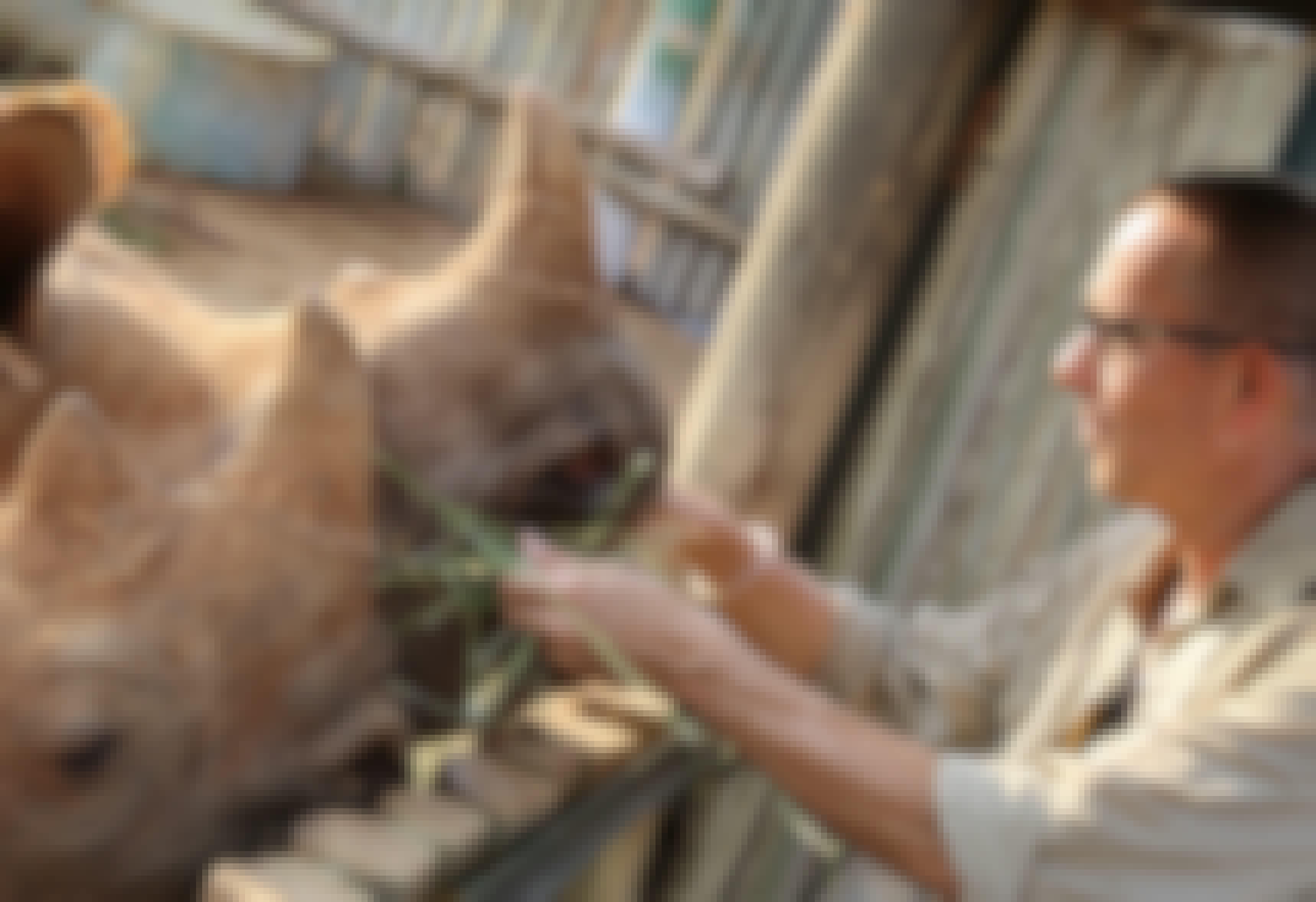 Martin and Julie While: Martin feeding rhinos at Care for Wild