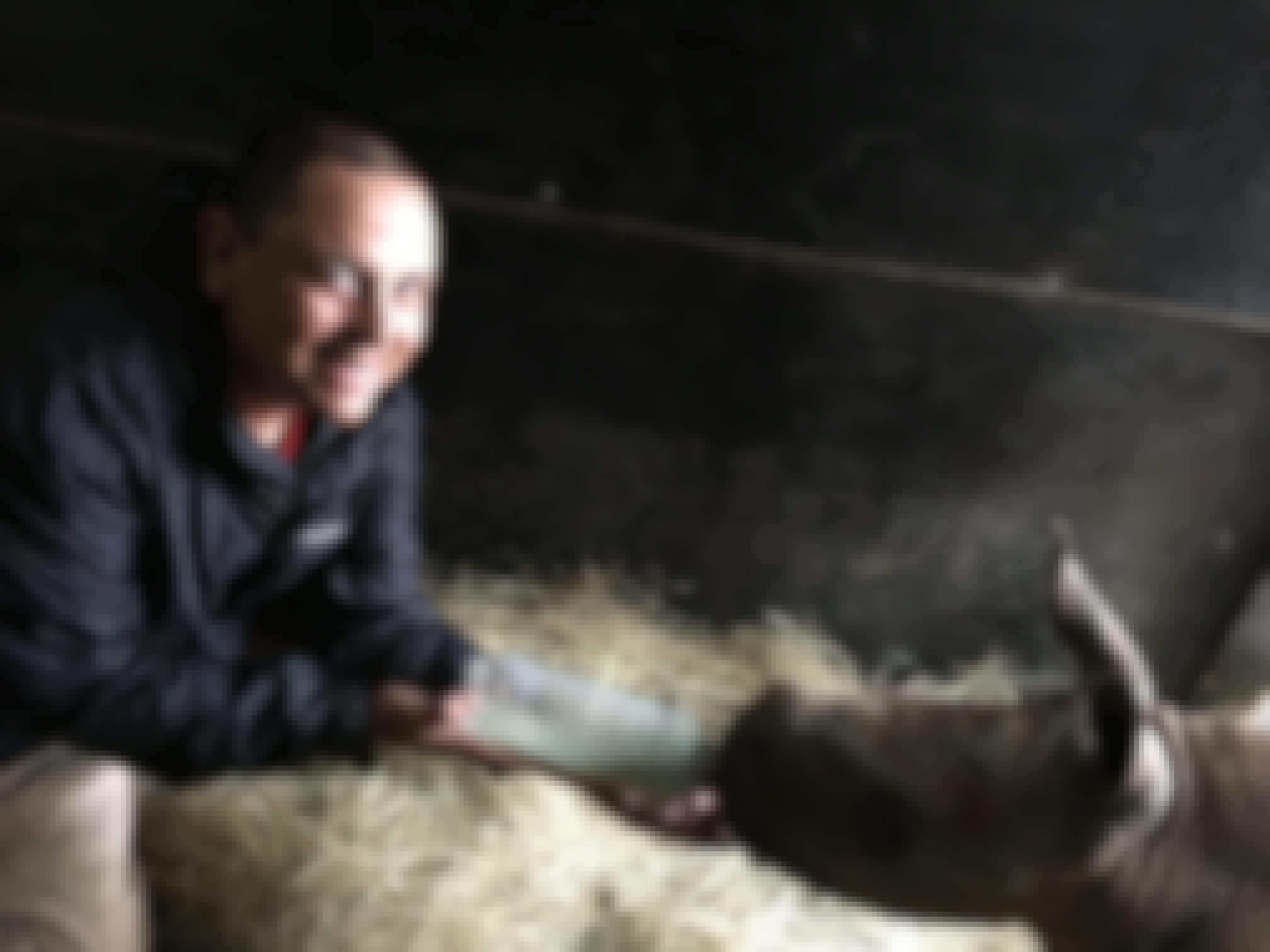 Mario Gabusi: bottle feeding a baby rhino