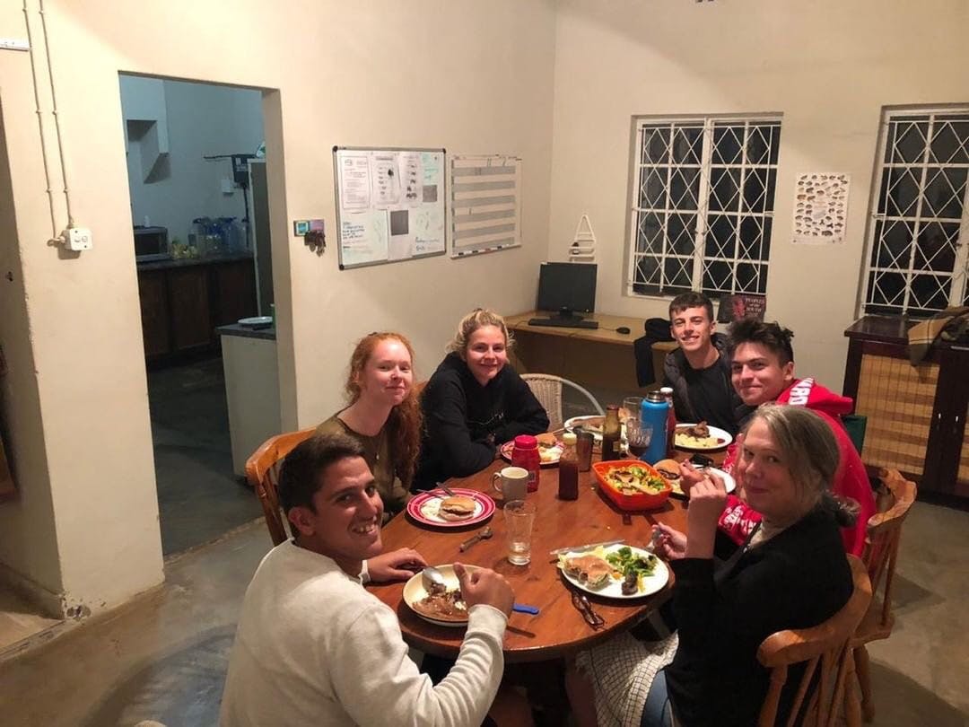 Group of volunteers relaxing at Phinda, photo taken by volunteer Kaden